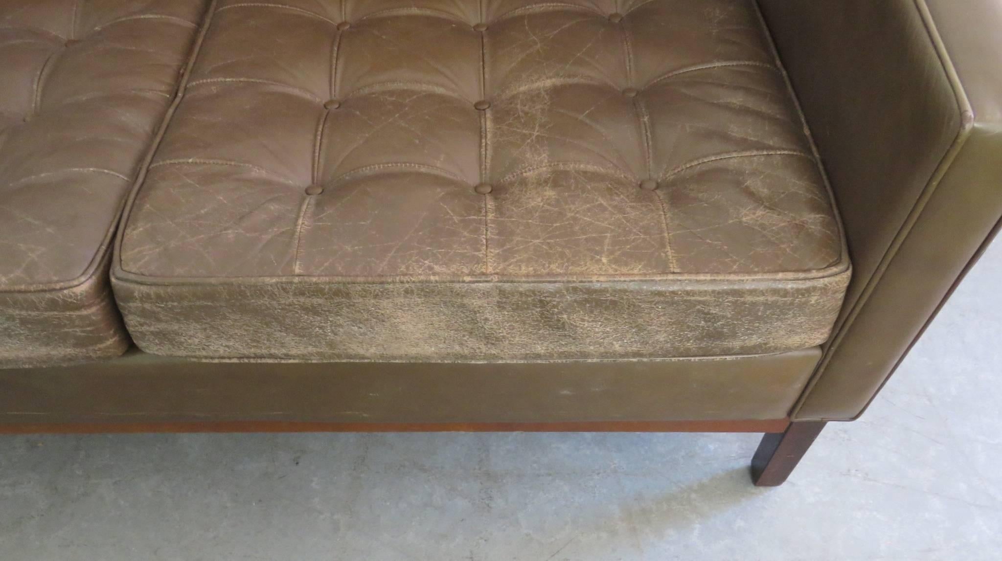 Knoll distressed tufted leather sofa. Size 16.5