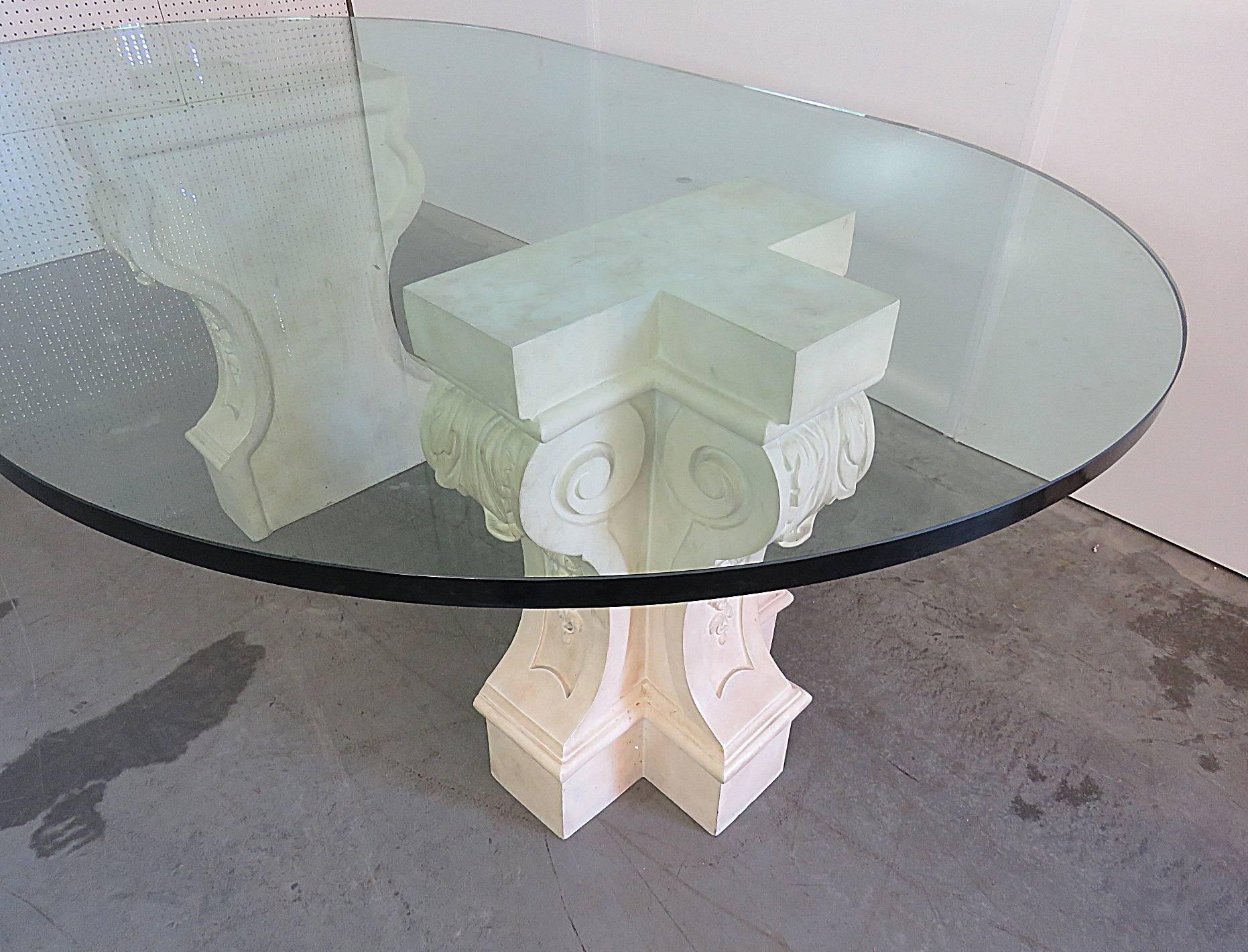 Hollywood Regency dining table with composition bases and a 1