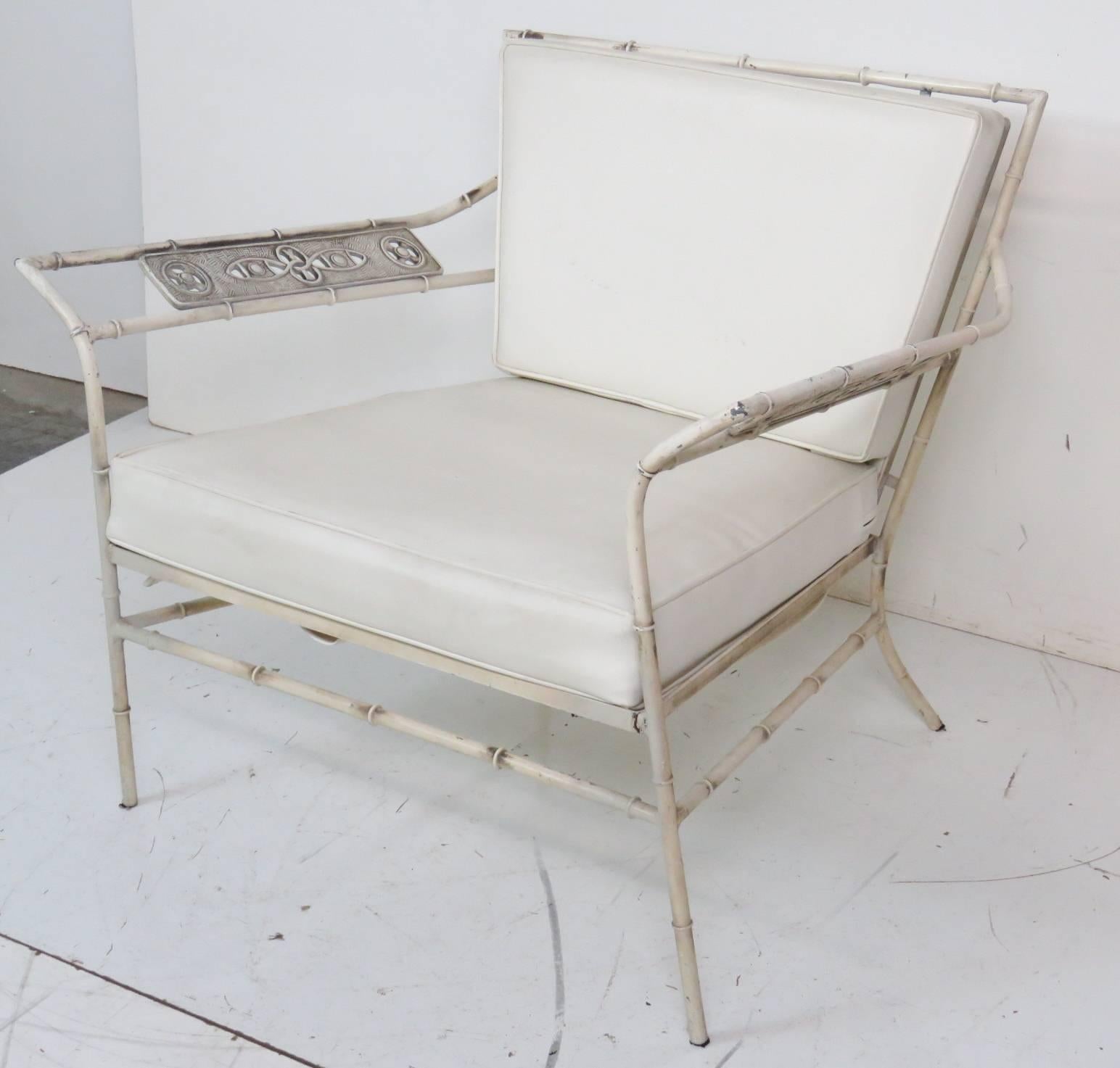 Salterini distressed painted faux bamboo lounge chair with Naugahyde upholstery.