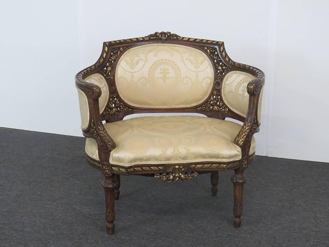 Louis XVI style carved wood settee with gilt decoration.