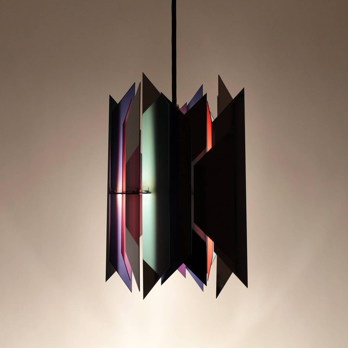 The Divan 2 is a spectacular top-tier Danish design piece by Simon P. Henningsen, produced by Lyfa.
If you are looking for grade A, top-tier, rare, collectible Danish designer lighting, look no further!

De-constructed diamond shaped steel pieces