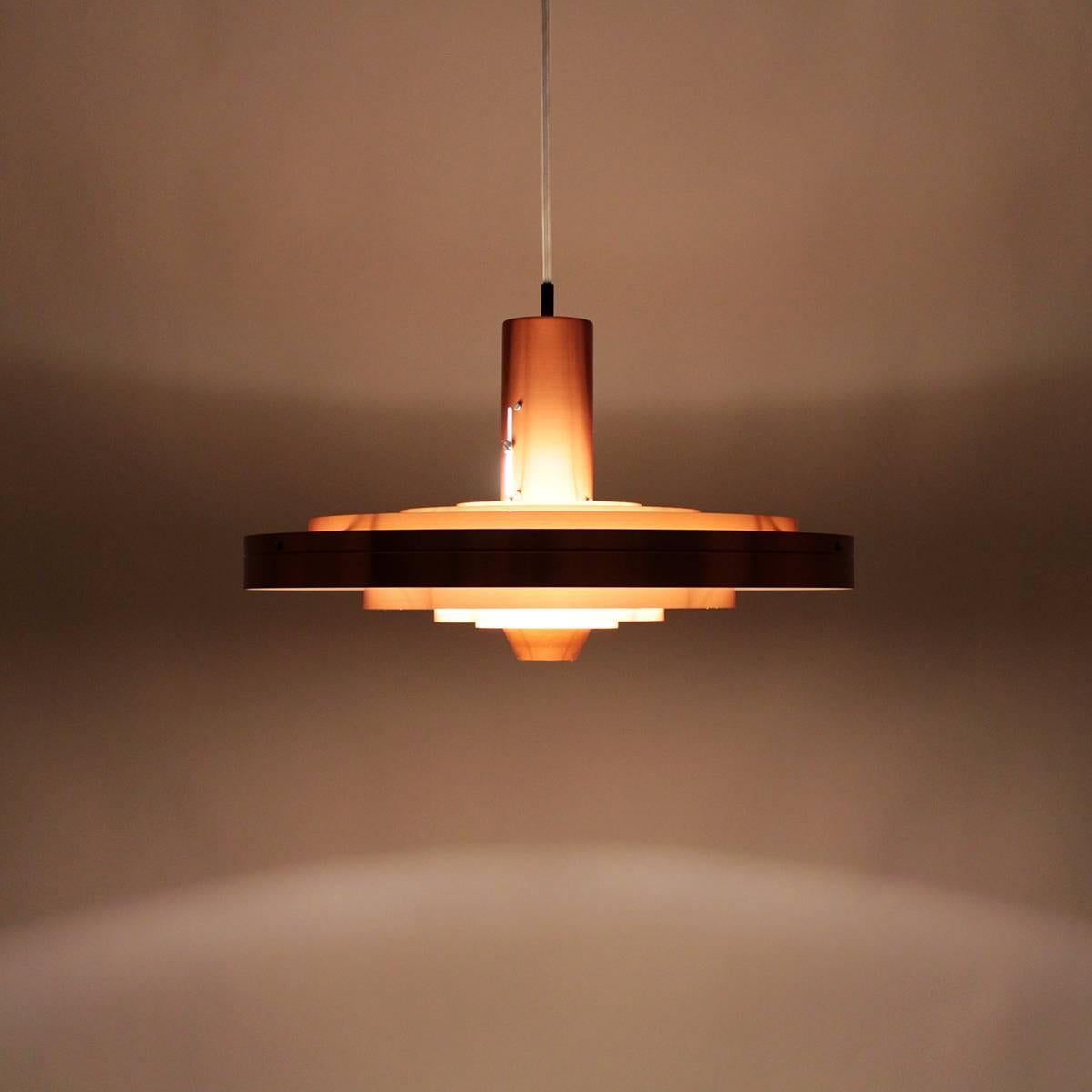 Fibonacci- copper pendant designed by Sophus Frandsen and produced for Fog & Mørup in 1963 - Attractive copper hanging lamp in very good (near excellent) vintage condition!

Rare and internationally sought after piece - absolutely stunning