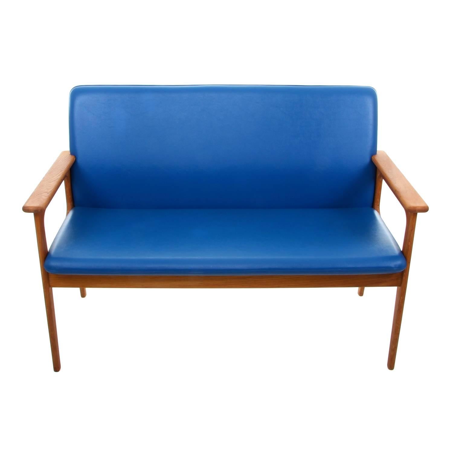 Scandinavian Modern Two-Seat Sofa by Erik Buch, 1970s, Oil-Treated Oak Couch with Blue Upholstery For Sale