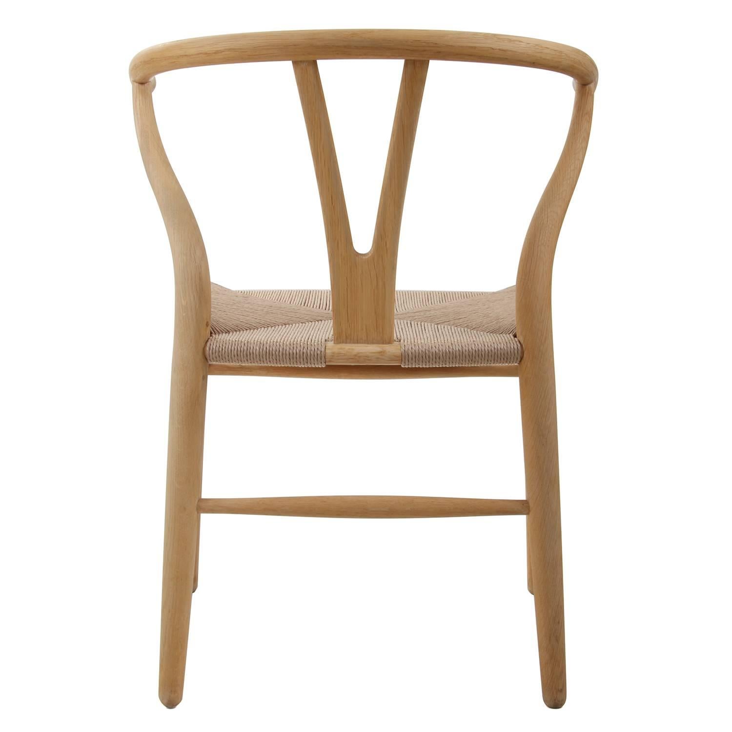 SOURCED and RESERVED for LUKE

***************
CH24 - pair of wishbone chair by Hans J Wegner for Carl Hansen and Søn in 1949, iconic Danish design - vintage oak wishbone-chair, soap-treated and fitted with new woven paper cord seat. In excellent