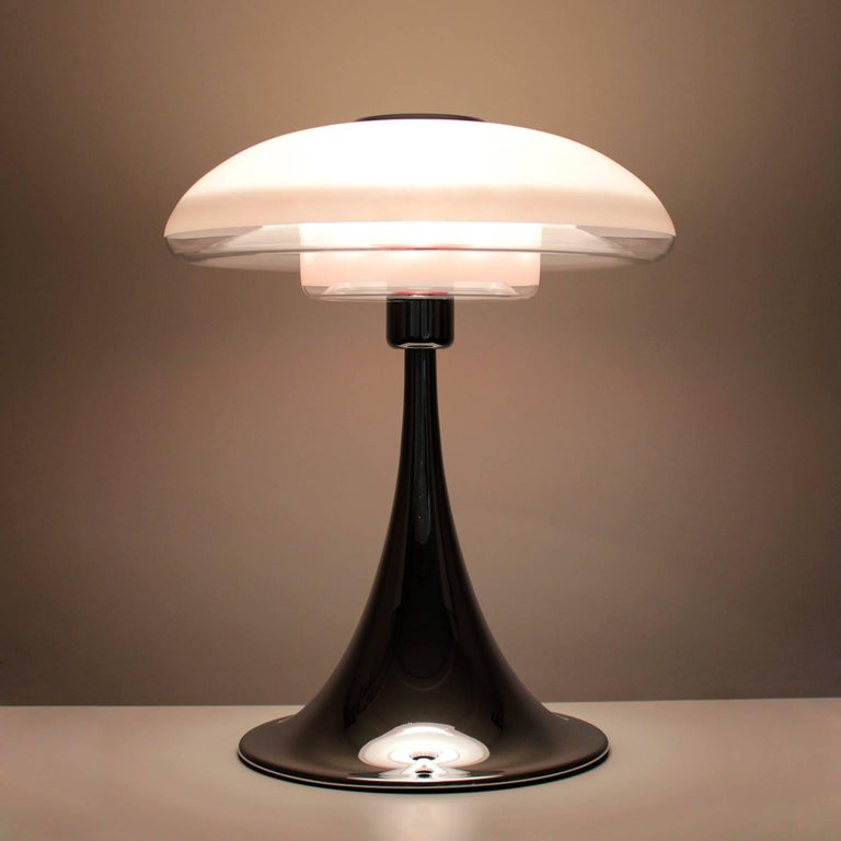 VP Europa, large table lamp by Verner Panton in 1977 and produced by Louis Poulsen the following year, extremely rare opal and chrome table light.

If you are looking for grade A, top-tier, rare, collectible Danish designer lighting, look no