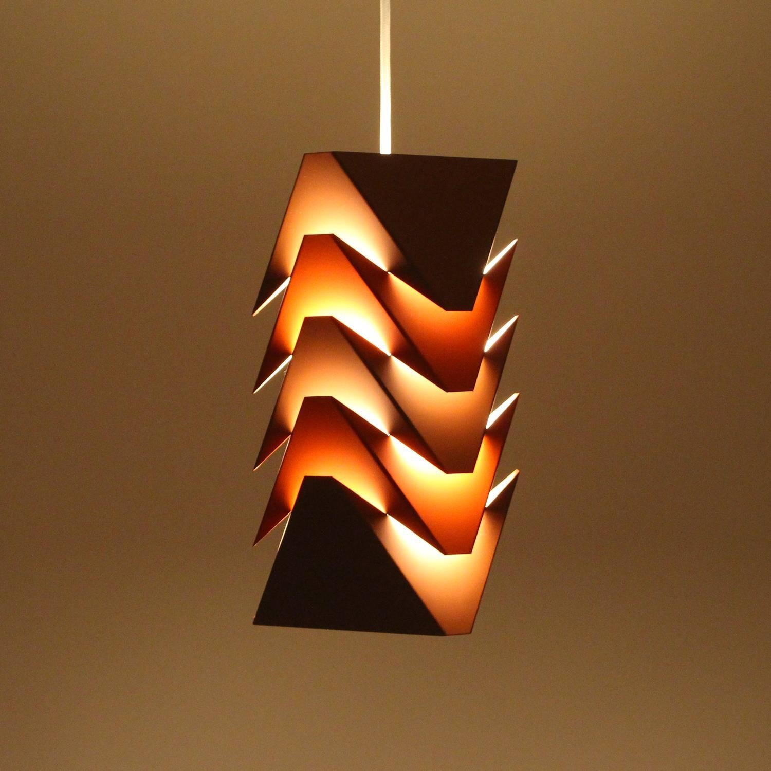 EKKO pendant by Louis Weisdorf for LYFA in 1968 - extremely attractive rare brown and orange hanging light in very good vintage condition.

Five thin lacquered metal pieces, angular shaped to fit perfect on top off each other, and together they