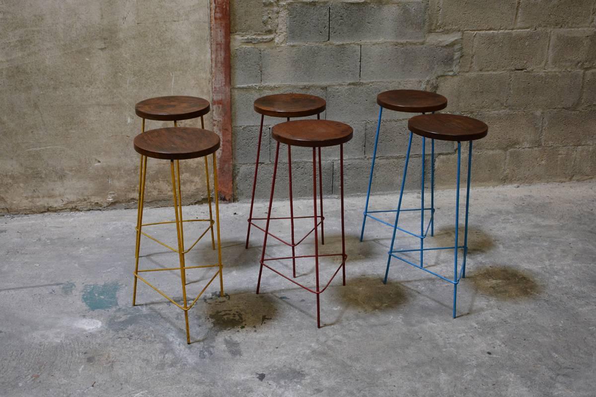 Pierre Jeanneret, set of six Hight stools from the College of Architecture in Chandigarh, India. Iron round tripod structure, painted in red, blue, and yellow  (two of each). 
REF PJ-SI-58-A page 570 in: Eric Touchaleaume & G. Moreau "Le