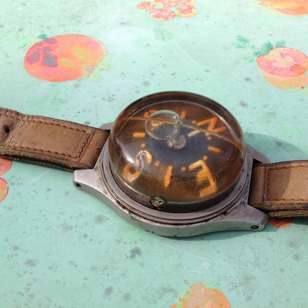 Very rare Panerai old Diving Compass from the WWII Italian Navy Commando: Wrist compass with stainless steel case and antimagnetic base secured by six screws, Plexiglas dome with luminous rubber line to the inside, black dial, luminous capital