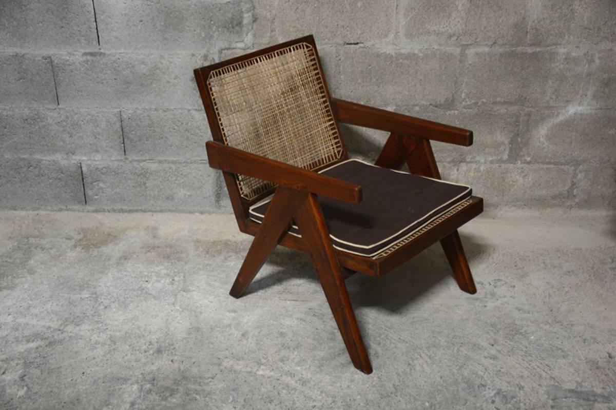 Pierre Jeanneret cane and teakwood easy armchair from Administrative building in Chandigarh, India. See photo before restoration when I bought it in Chandigarh. REF 9.
Literature: REF PJ-SI-29-A page 563 in: Eric Touchaleaume & G. Moreau