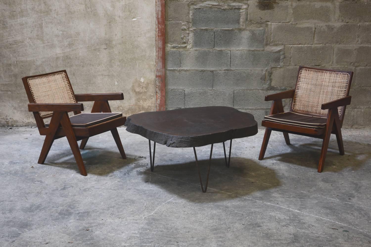 Pair of Pierre Jeanneret cane and teakwood easy armchair from Administrative Building in Chandigarh, India. 

These armchairs are completely original except the caning (all these chairs have been re-caned five or six times during their 60 years