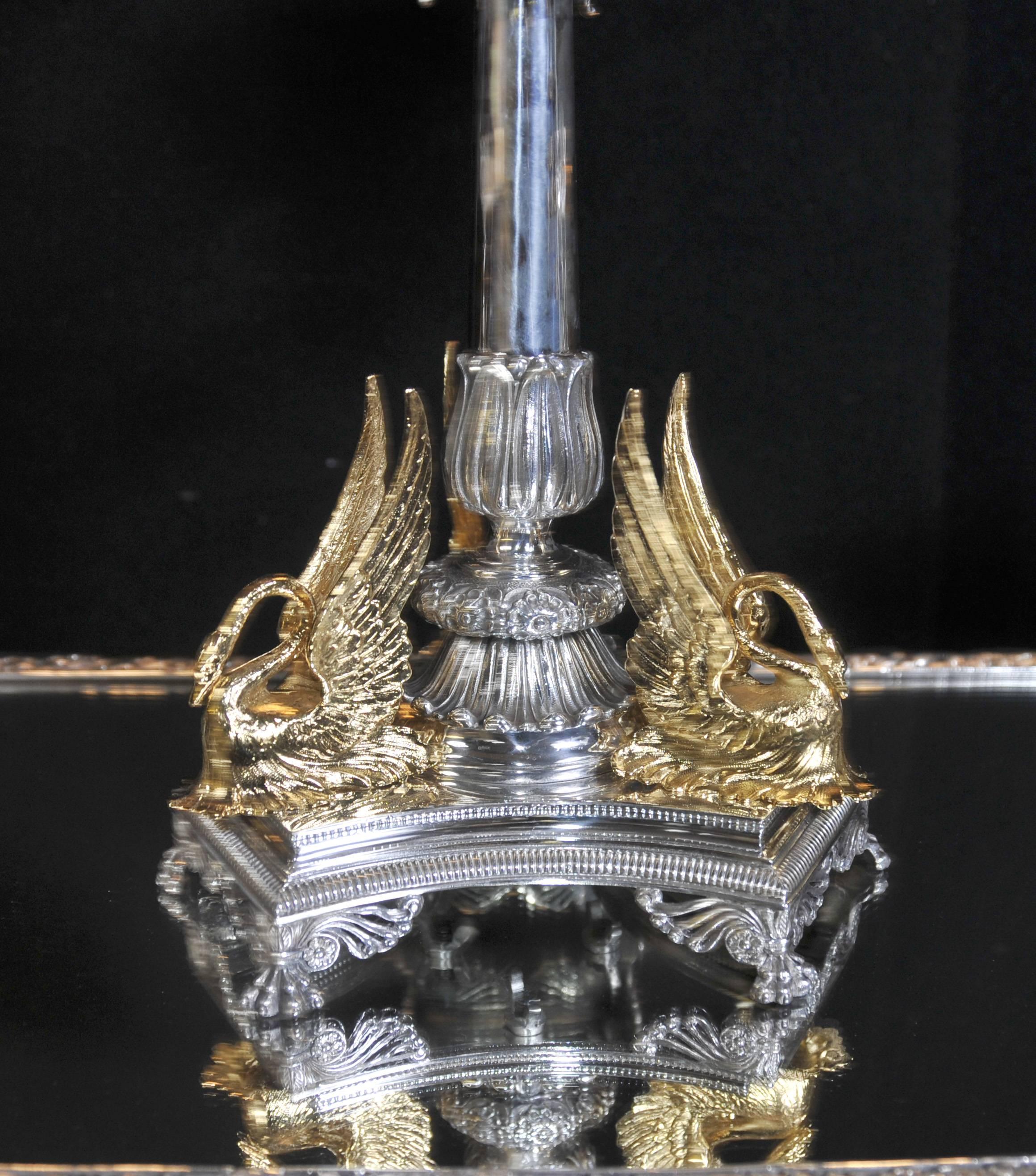 Mesmerizing Victorian style silver plate epergne or centre piece.
Hopefully the photos do this amazing piece some justice definitely better in the flesh.
Each piece features the set of gold leaf Royal swans to the base, offset nicely against the