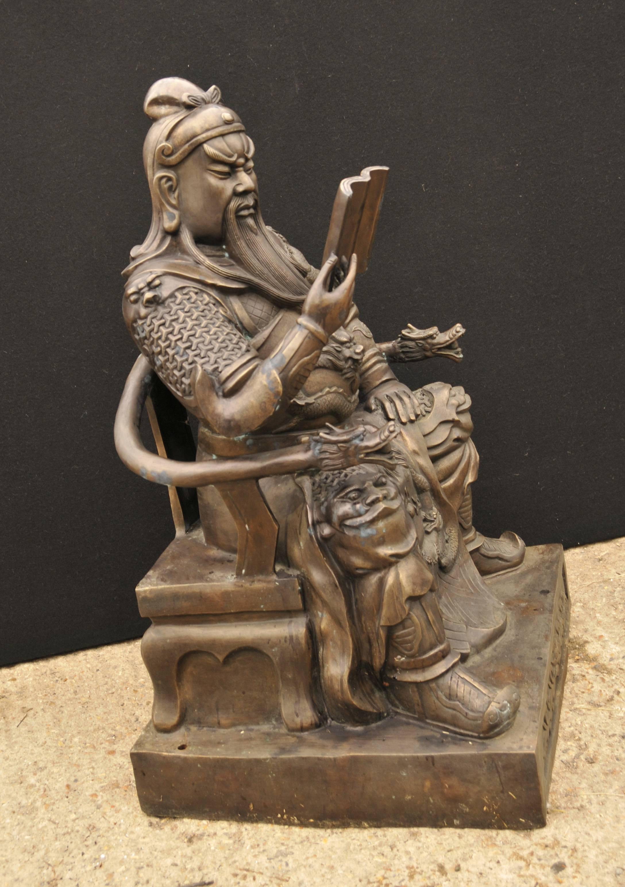 Stunning large bronze statue of a Japanese warrior reading.
Stands in at over four feet tall so of an architectural quality.
So well cast, just look at the details to his dress and facial expression.
Lovely patina to the bronze.
I love the
