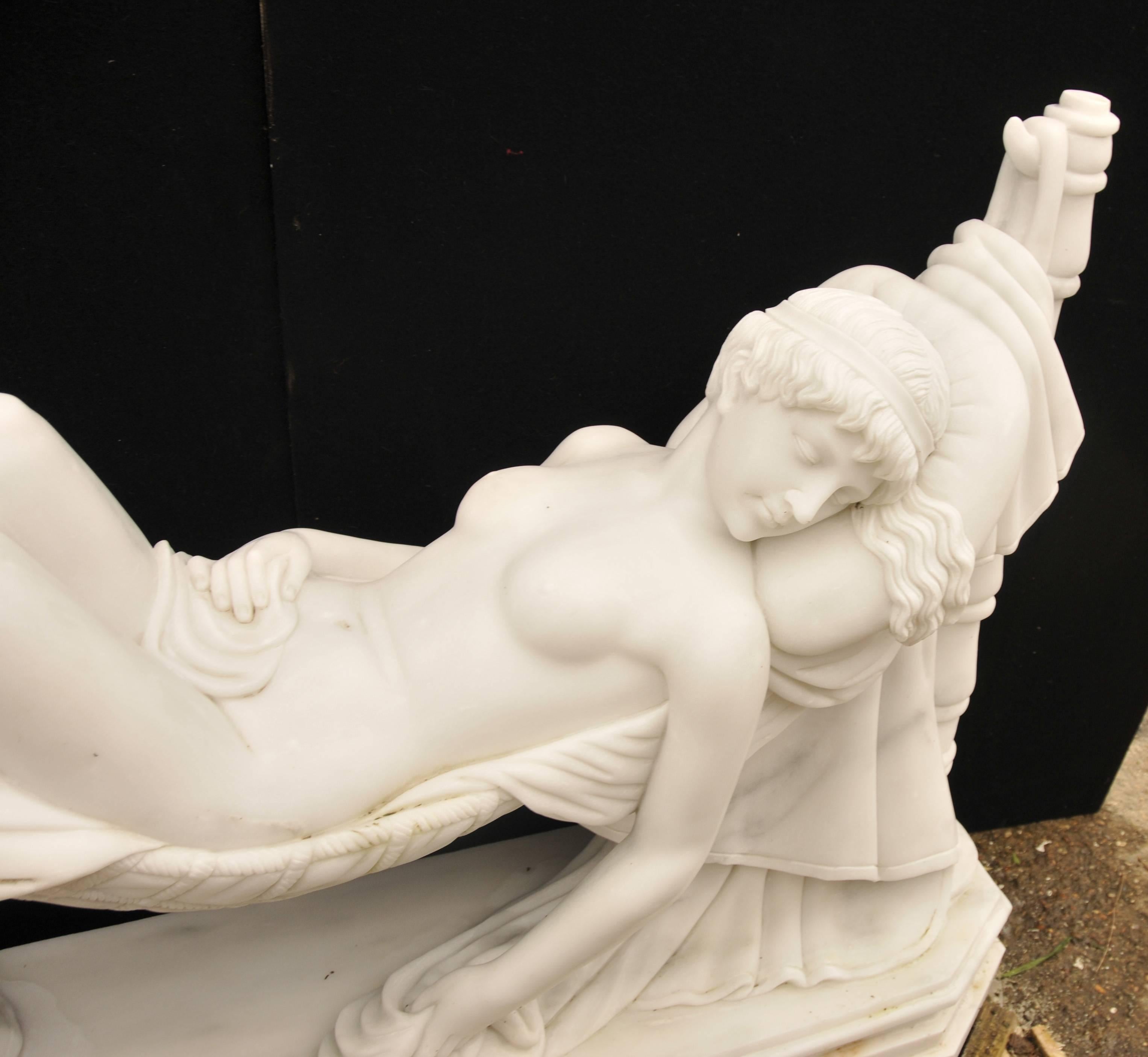 Gorgeous hand-carved Italian marble statue depicting a beautiful female nude asleep in a hammock.
Piece originally by Antonio Frilli from the late 19th Century in Italy and this is a copy.
Stunning work of beauty - over four feet long so