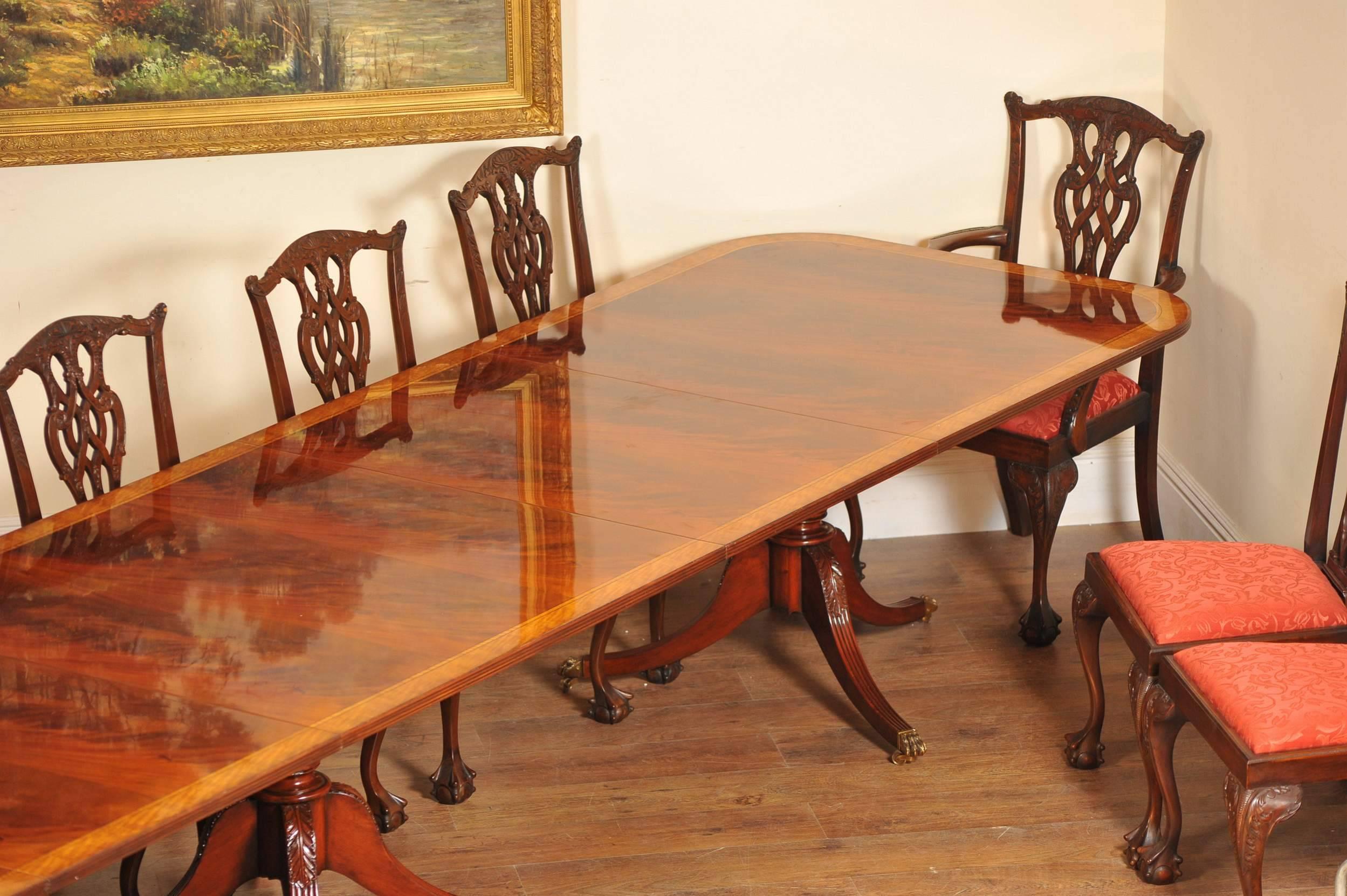 Regency style pedestal dining table in mahogany with satinwood crossbanding.
Come view this for yourself in our Hertfordshire warehouse.
Matching set of ten mahogany Chippendale style dining chairs, two arms and eight side chairs.
Very