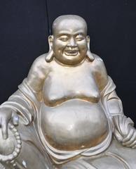 A modern bronze figure of the Laughing Buddha, late 20th century