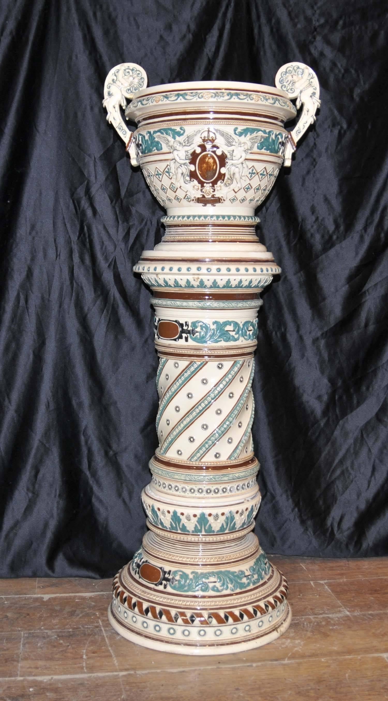 Gorgeous English Majolica porcelain planter on a stand - I love everything about this work of art, the muted earthy color palette and the deep glaze to the iron and blue colors. This will look great inside or out, to be complemented green foliage