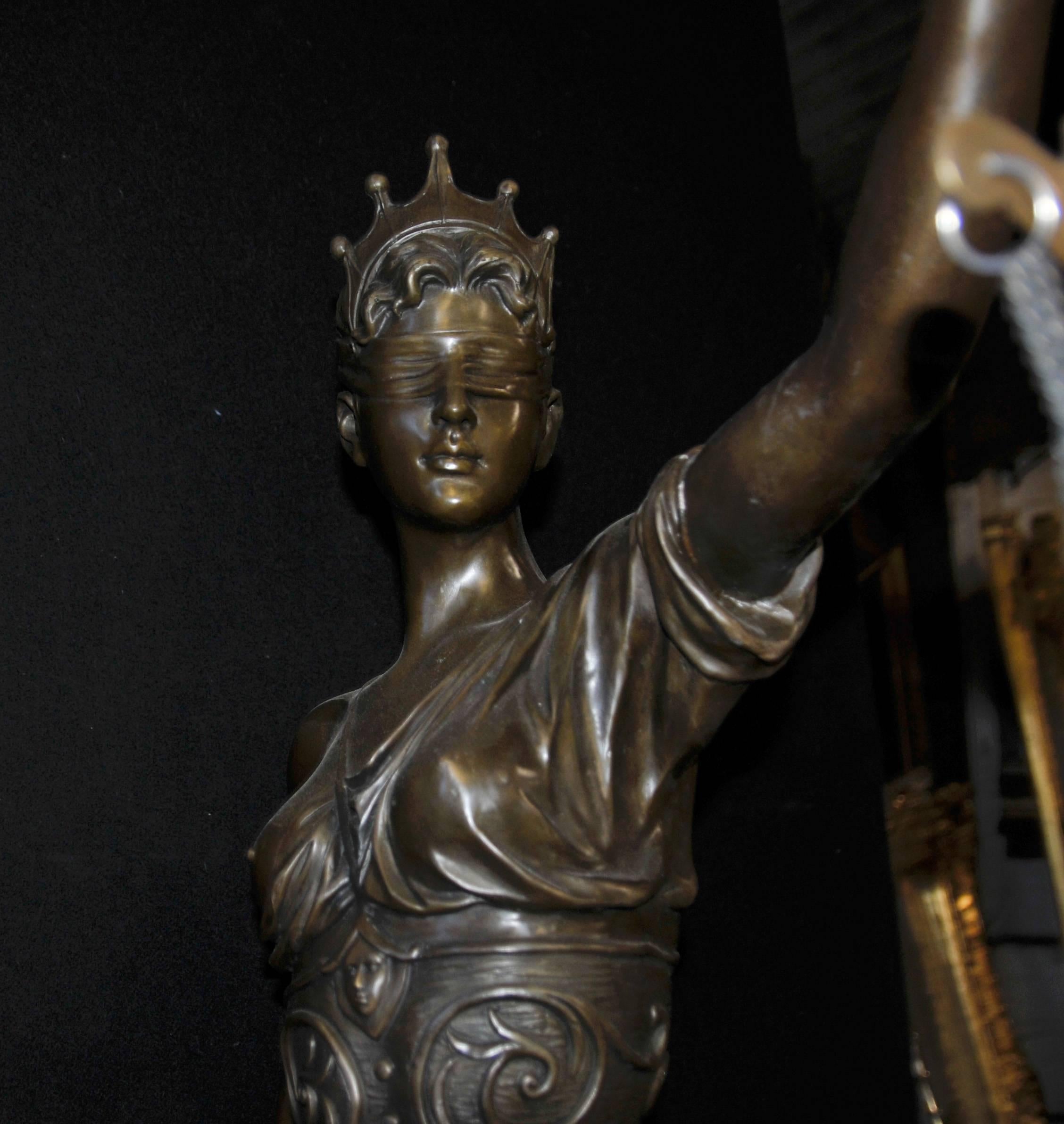 Large French bronze casting of the Classic Lady Justice on a marble base, stands over 6 feet tall so important size to this architectural piece - Patina to the bronze is fantastic, with lovely dark hue - Casting is so well executed from a French