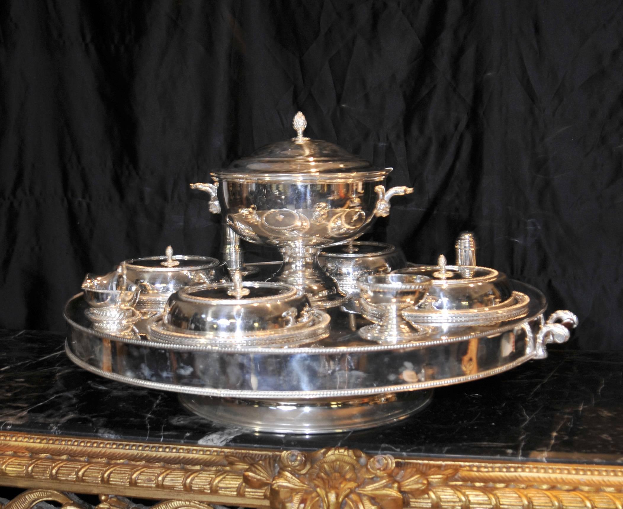 Gorgeous English Sheffield silver plate lazy susan - or dumb waiter server.
Piece serves numerous functions as a hot plate to keep food warm and the whole things revolves for ease of serving.
The food would be heated by having hot water inside the