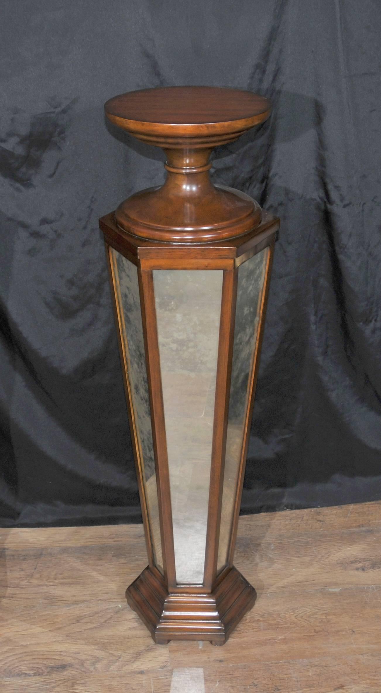 Available to view in the Canonbury Antiques Hertfordshire showroom, just 25 minutes north of London.
Pair Art Deco Style mirrored pedestal stand tables.
Such a great look to this pair with the antiqued finish to the mirrored glass.
Classic deco