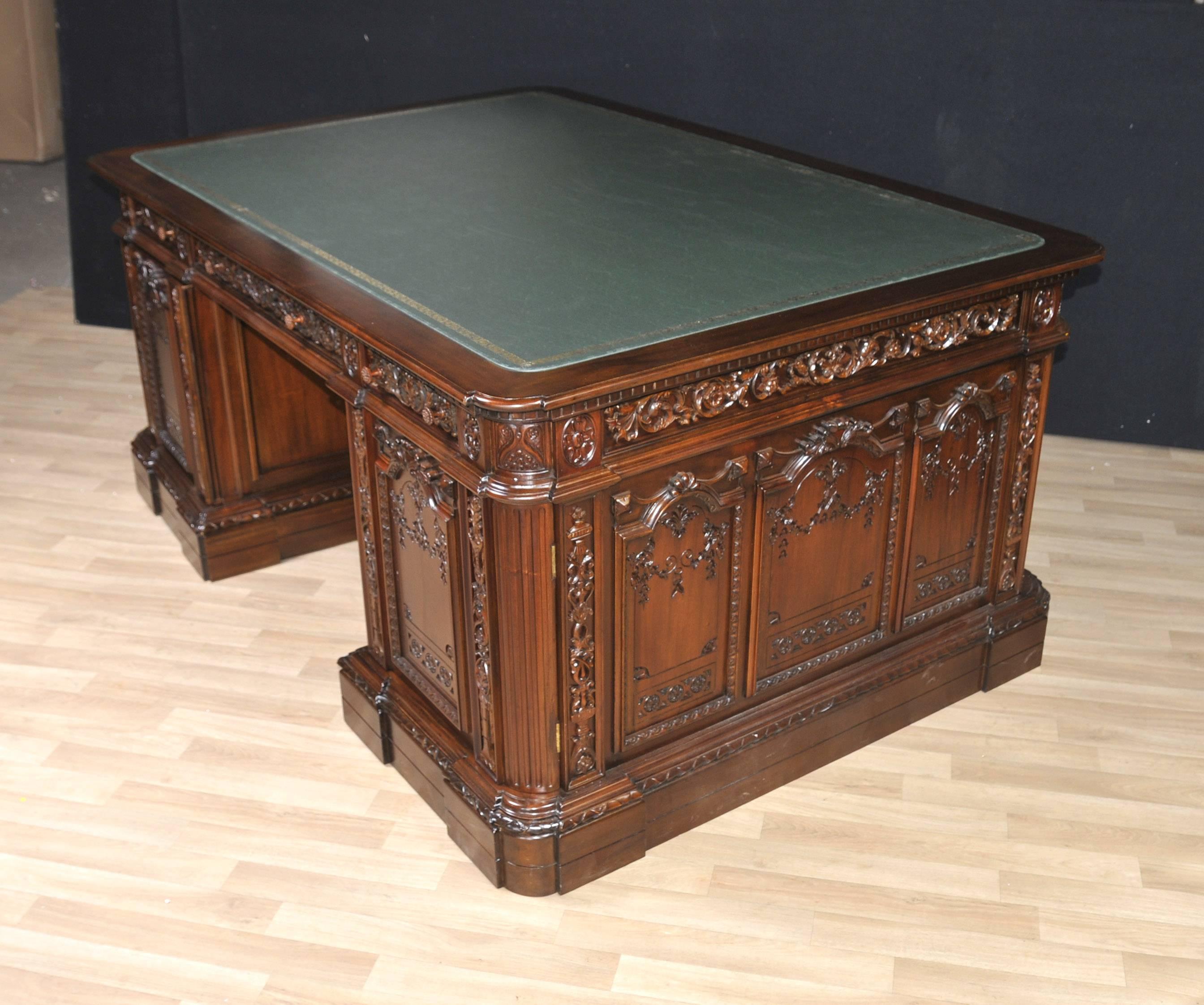 You are viewing a totally unique large Presidents Resolute desk hand-carved from the finest mahogany. I hope the photos do this stunning work of art some justice, it's certainly better in the flesh. This desk is an exact replica of the desk
