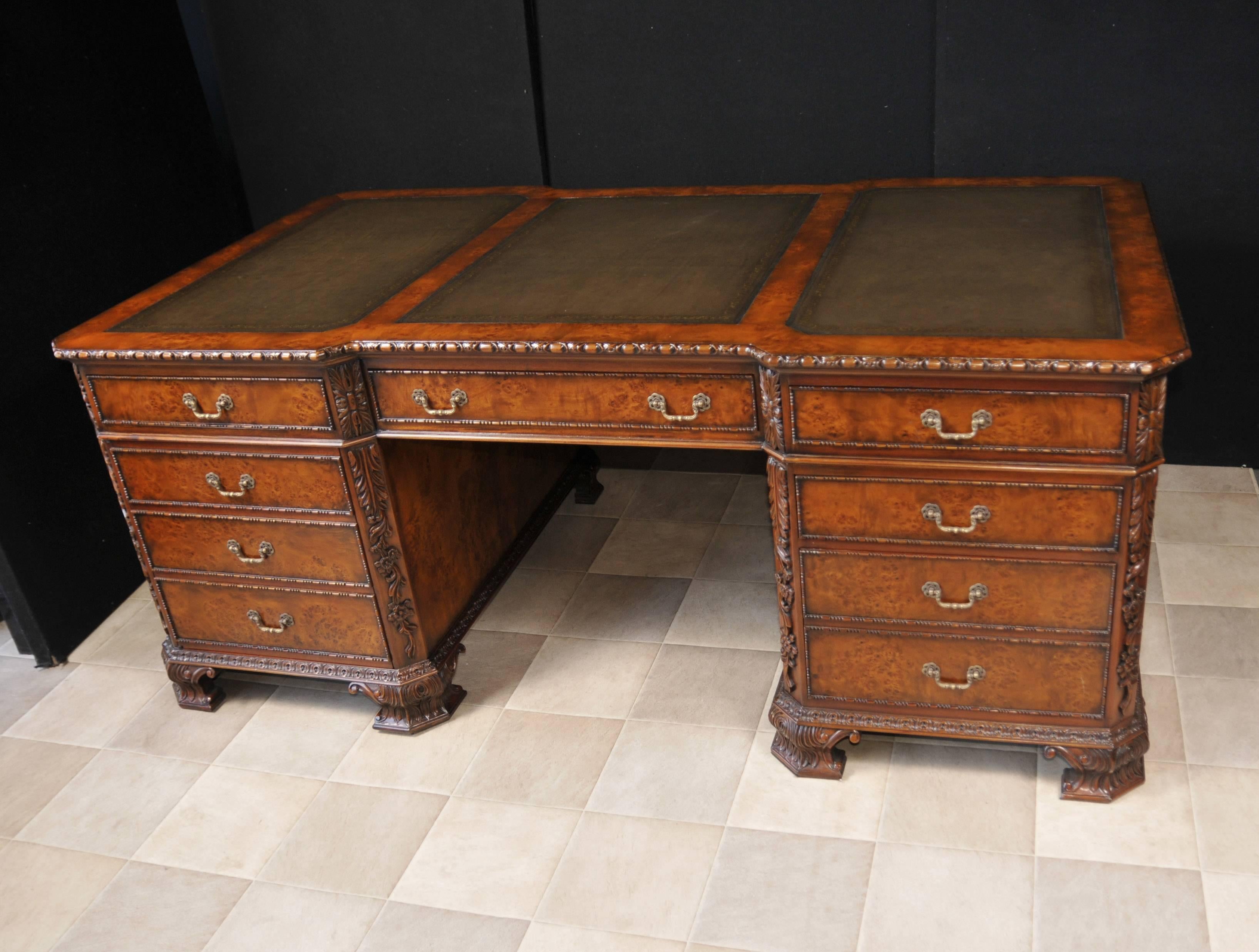 Exquisite Regency style partners desk in walnut.
A partners desk refers to the fact that there are drawers on both sides of the desk.
The two pedestals have one side drawers and the other side a cabinet (or they could be switched so both sides are