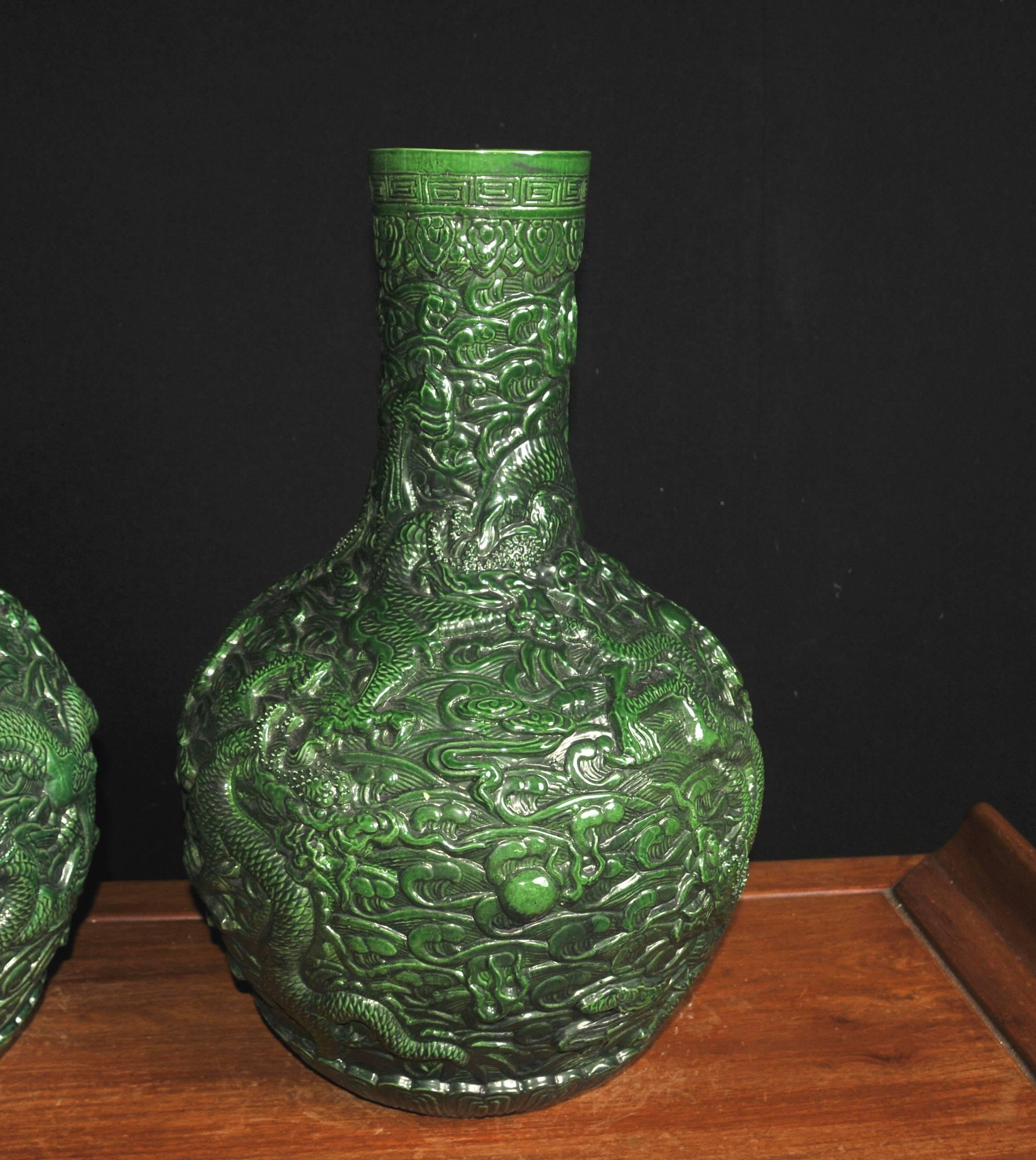 Late 20th Century Pair of Chinese Green Cinnabar Lacquer Dragon Vases Urns Bulbous Urn