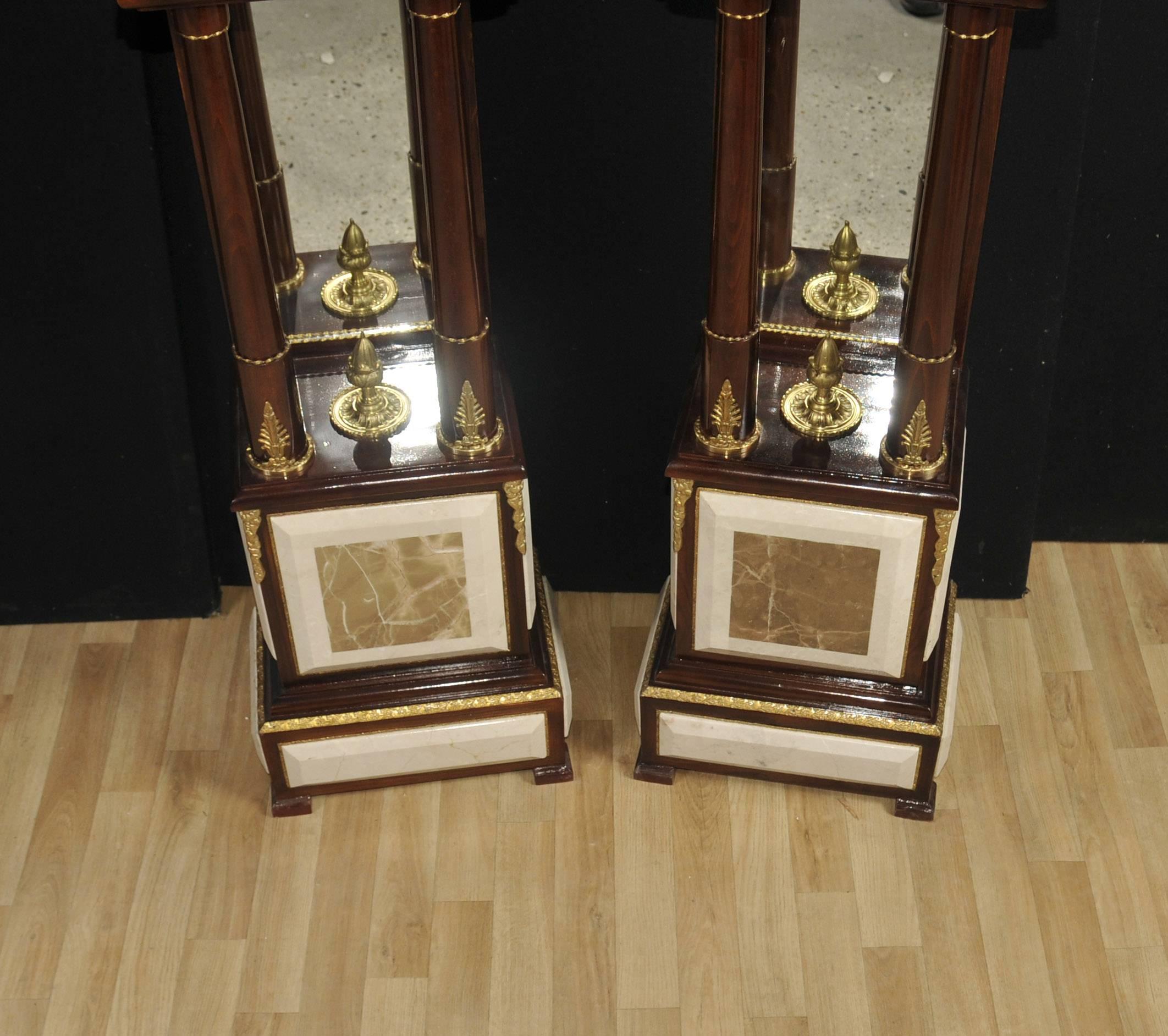 Stunning pair of French Empire style marble column stands.
Great for displaying vases, busts and other decorative pieces.
Mirrored section great for adding space and light to any interior.
Handcrafted from kingwood, marble, ormolu and with