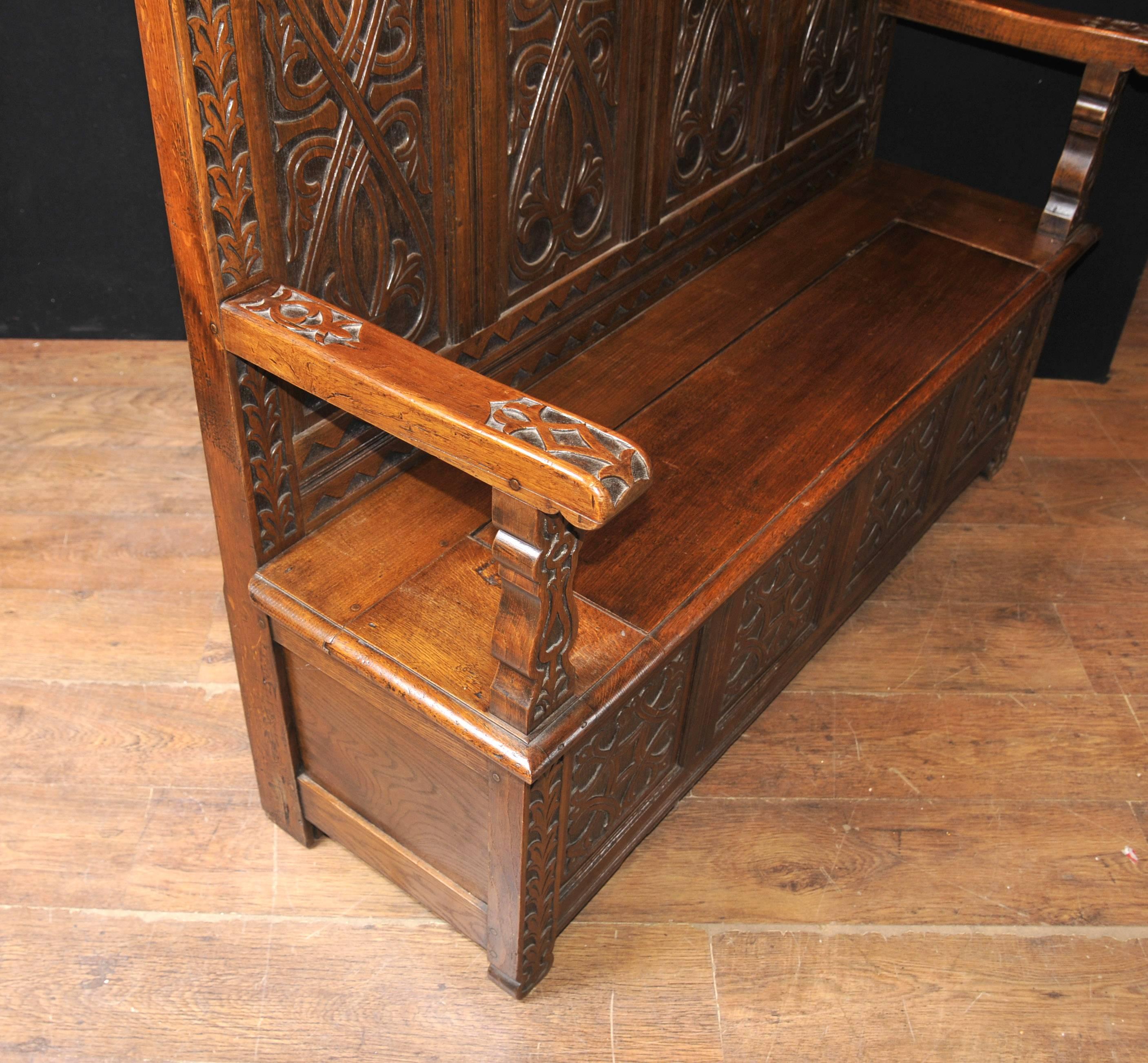 Antique 19th century hand-carved oak monks bench or settle.
Stunning work of an architectural quality.
We date this to the early 1800s and it really was quite a find.
The hand-carved details are amazing, with various Celtic motifs verging on the