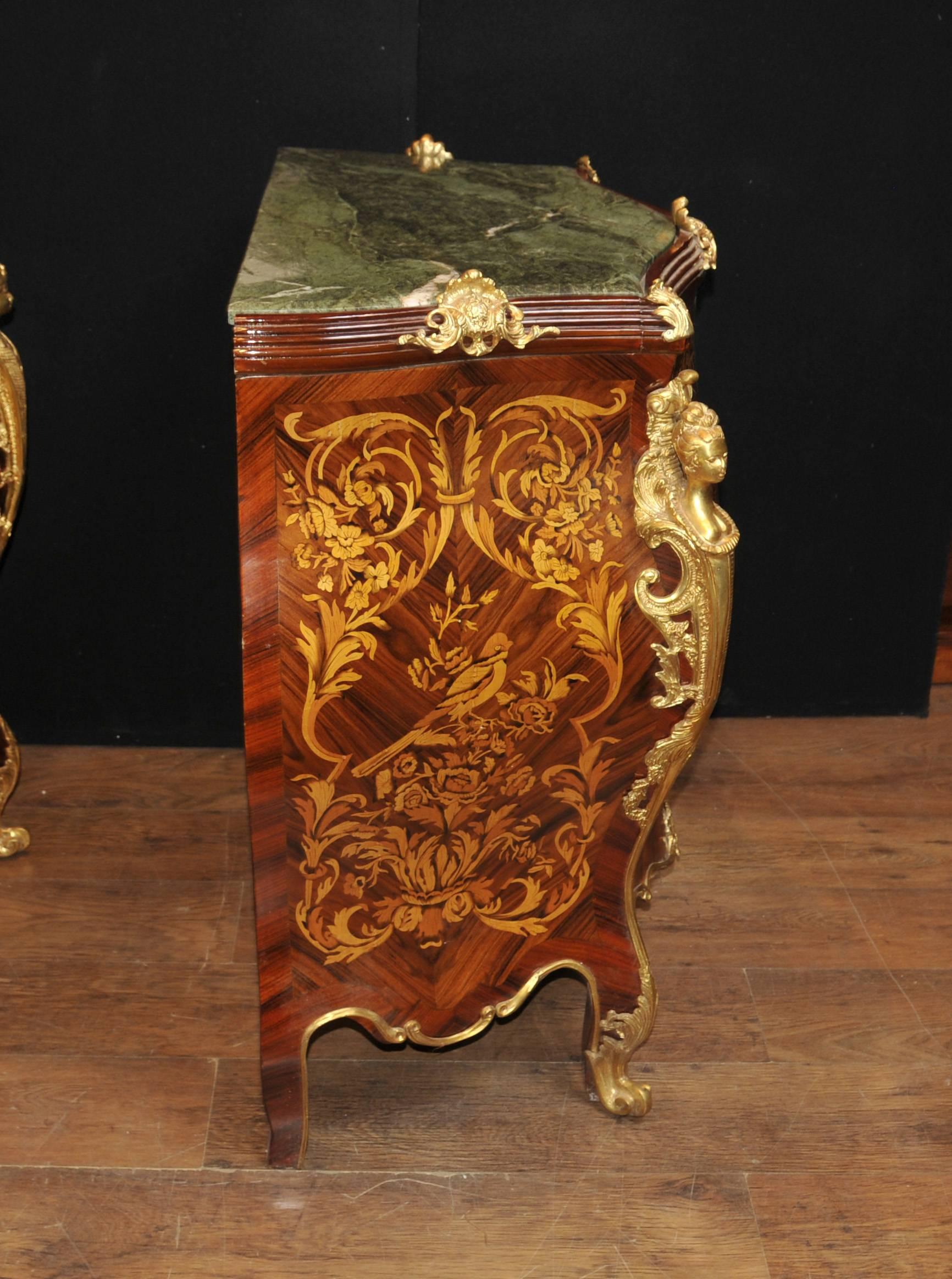 Eye-catching pair of French Louis XVI style commodes of bombe form
The bombe shape refers to the exaggerated curves to sides and front
Ormolu fixtures are incredible with great patina including female busts to side, legs and sabots
Three drawers