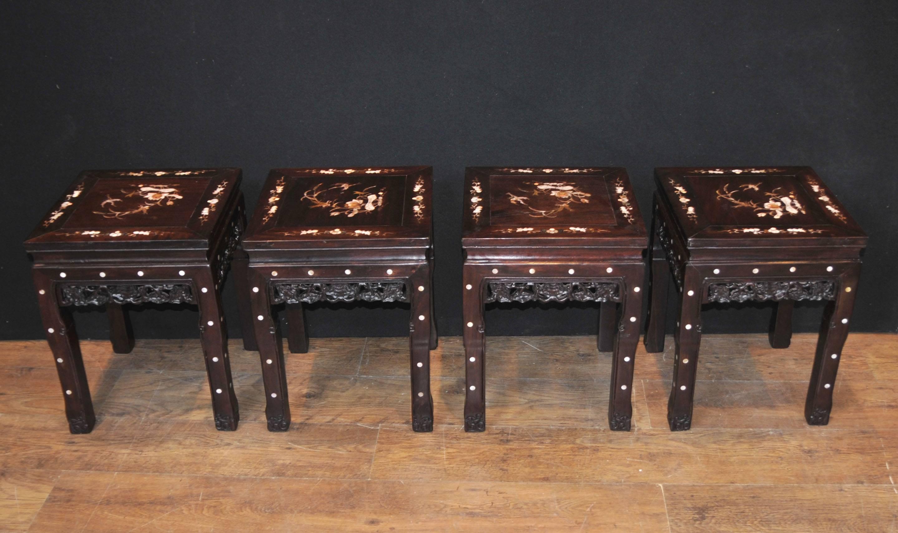 Gorgeous antique Chinese hardwood dining set consisting of a square table and four stools.
Handcrafted from hardwood which is very solid and sturdy.
Hand-carved details include intricate apron to table, very florid and skilled in