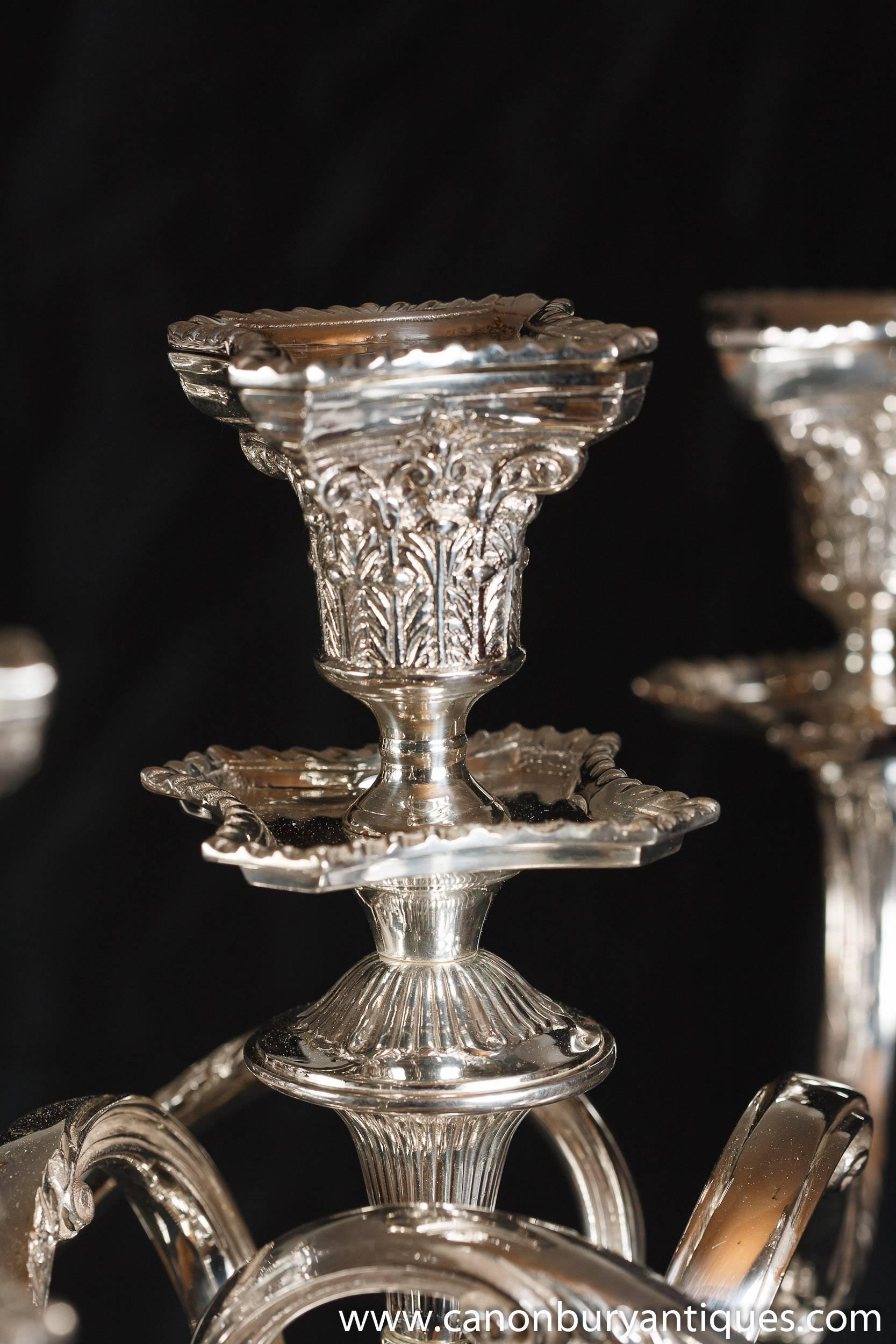 Come view these for yourself in our Hertfordshire warehouse. 20 minutes north of London.
Stunning pair of Regency style silver plate candelabras.
In the form of Classic doric columns as the main stem leading to the ornate candelabras