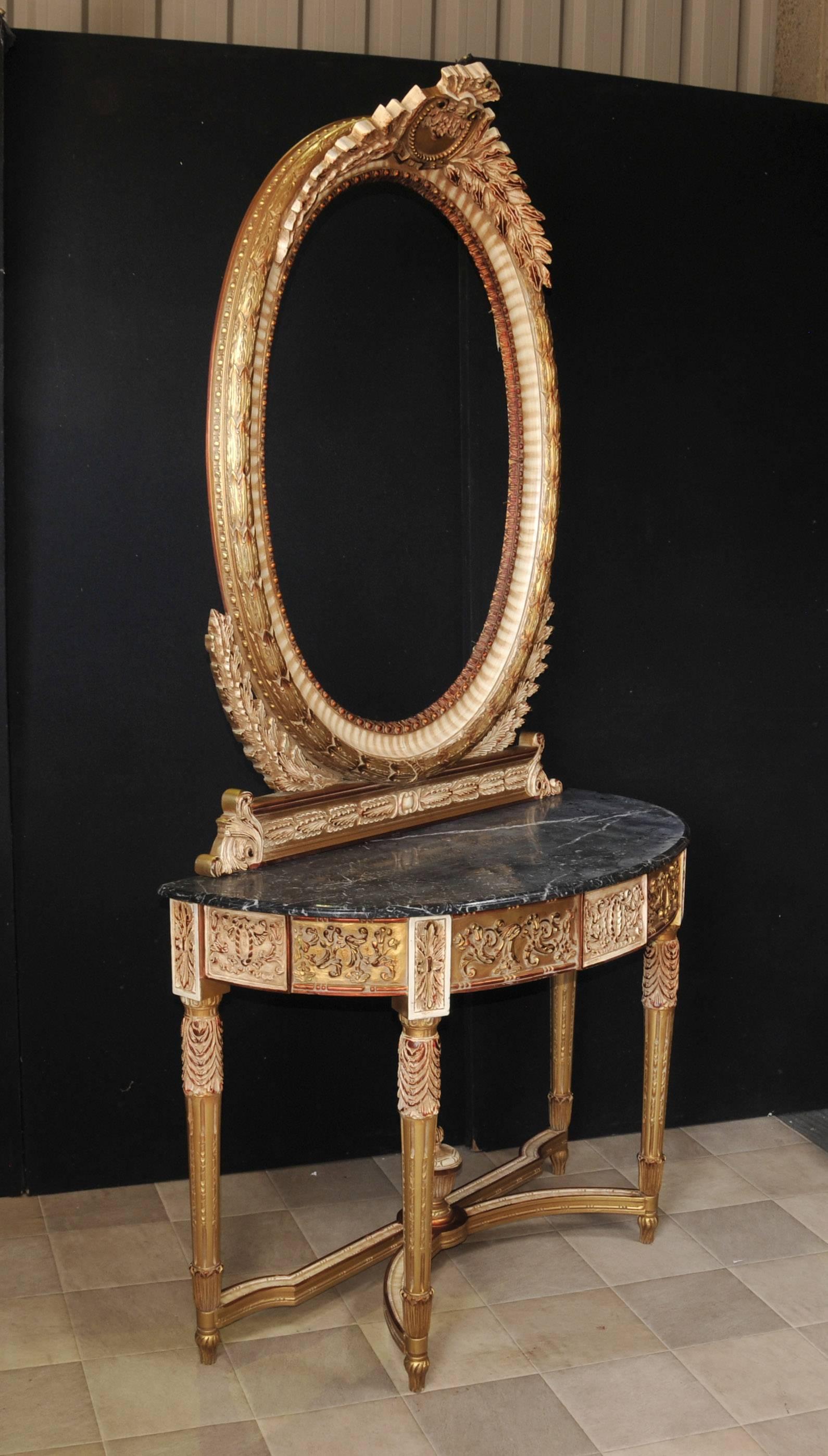 Gorgeous empire style mirror and console table set.
Good size to this, perfect for an entrance hall or sitting room.
Hand-carved base and mirror frame incredibly ornate and finished in blushed giltwood.
Giltwood has a lovely muted colour scheme,
