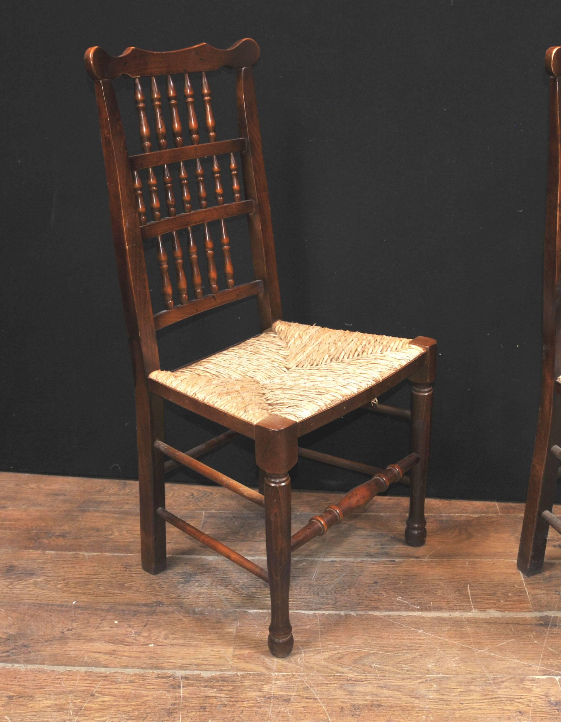 Gorgeous set of eight English oak spindle back chairs.
Set consists of two armchairs and six carvers.
Classic farmhouse kitchen look with this gorgeous set.
Handwoven rush seats, very comfortable to sit in.
Various farmhouse refectory tables to