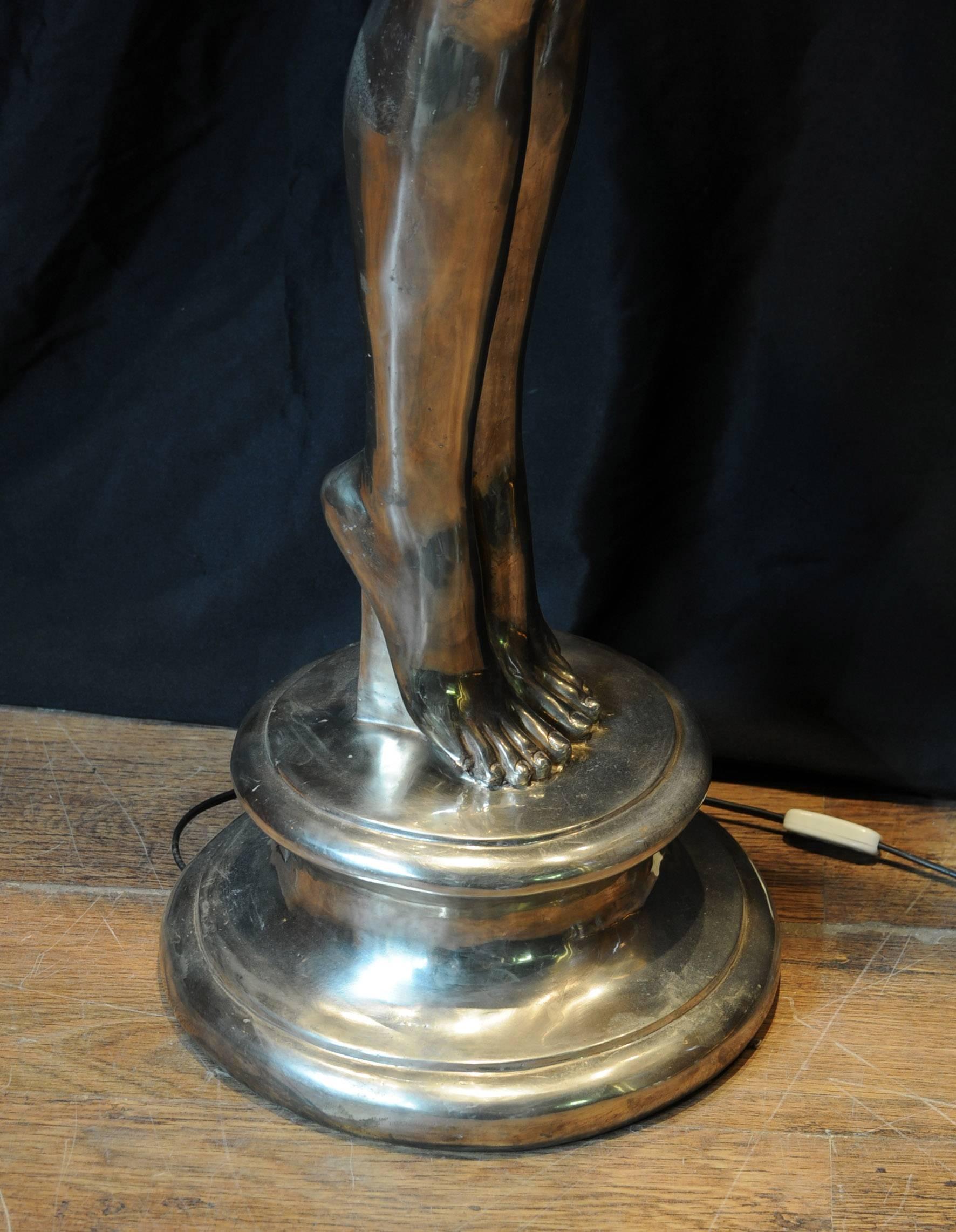 - Come view in our antiques showroom in Hertfordshire, just 25 mins north of London.
- Stunning large bronze art deco lamp in the shape of a classic biba girl.
- Bronze statue somehow embodies the 1920s aesthetic.
- Large piece of an