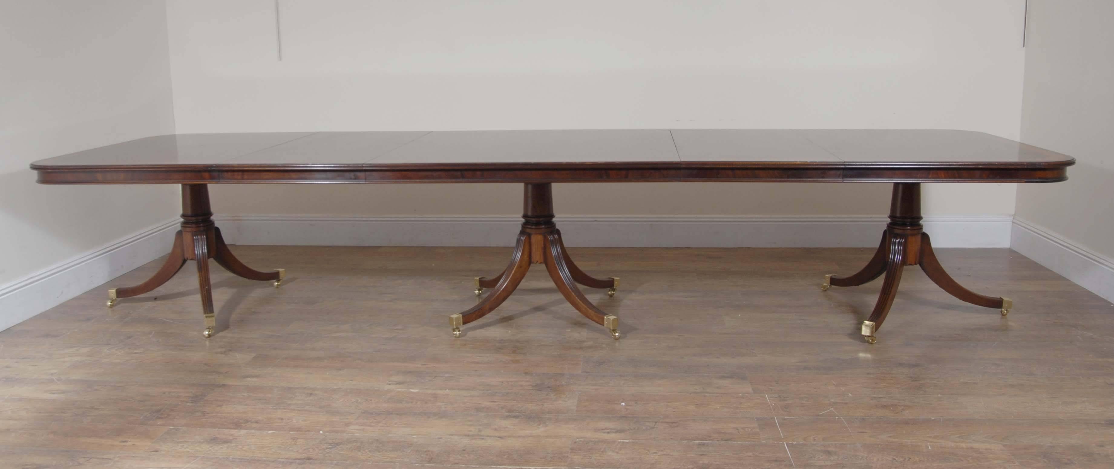 Viewings possible in our Hertfordshire warehouse - please contact.
Absolutely stunning triple pedestal Regency style dining table in mahogany.
Table measures 13.5 feet when fully extended - seats 10-12 people.
Table has three leaves and three
