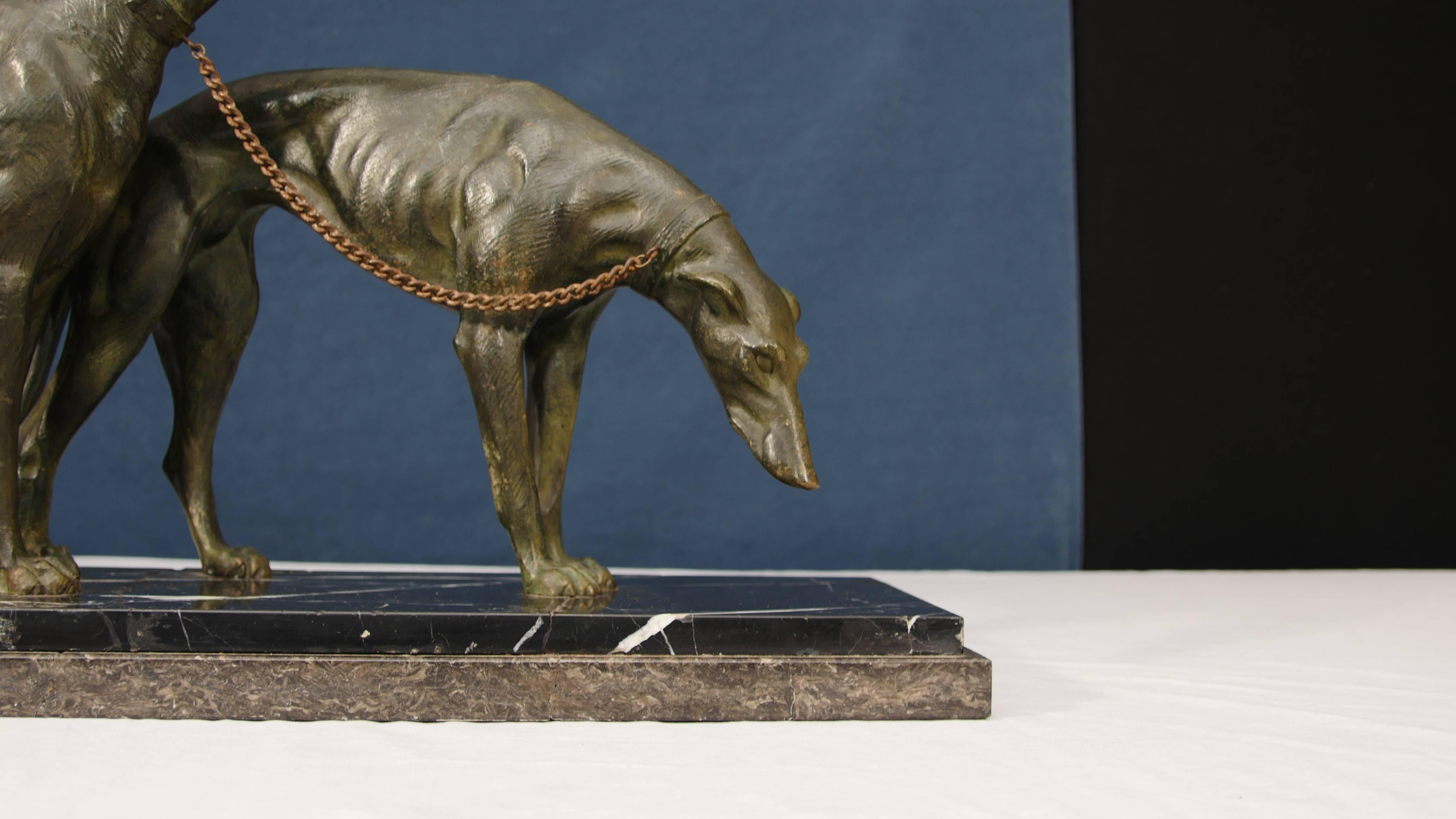 Pair of important and original Art Deco bronze greyhounds signed Salvatore Melani
Such a good look to these and they Stand on the black marble plate which is smooth and chip free
Melani was a famous Italian artist and his signature is on the