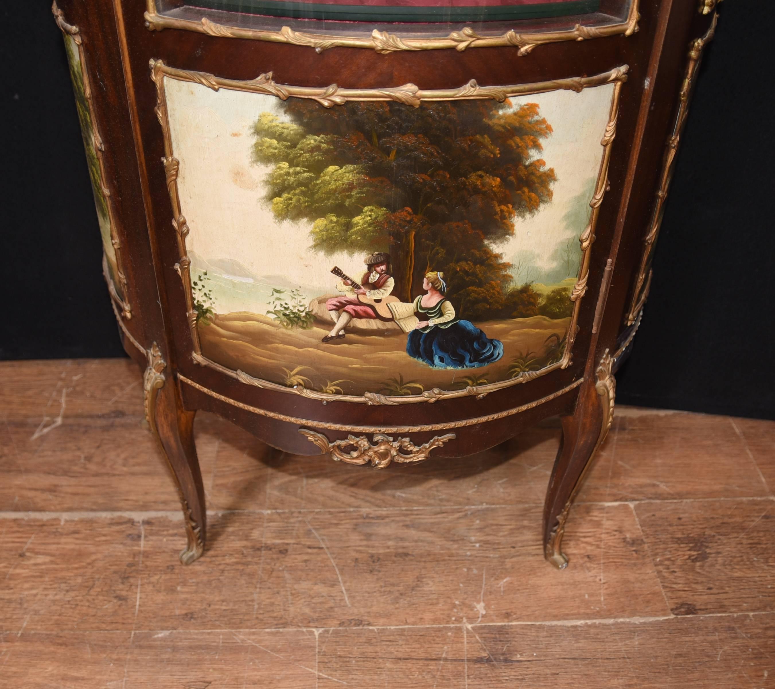 Gorgeous French antique display cabinet with Vernis Martin style painted plaques
Main cabinet crafted from kingwood with ormolu fixtures
Painted plaques show various Romantic scenes
Purchased from a dealer on Rue De Rossiers at Paris antiques