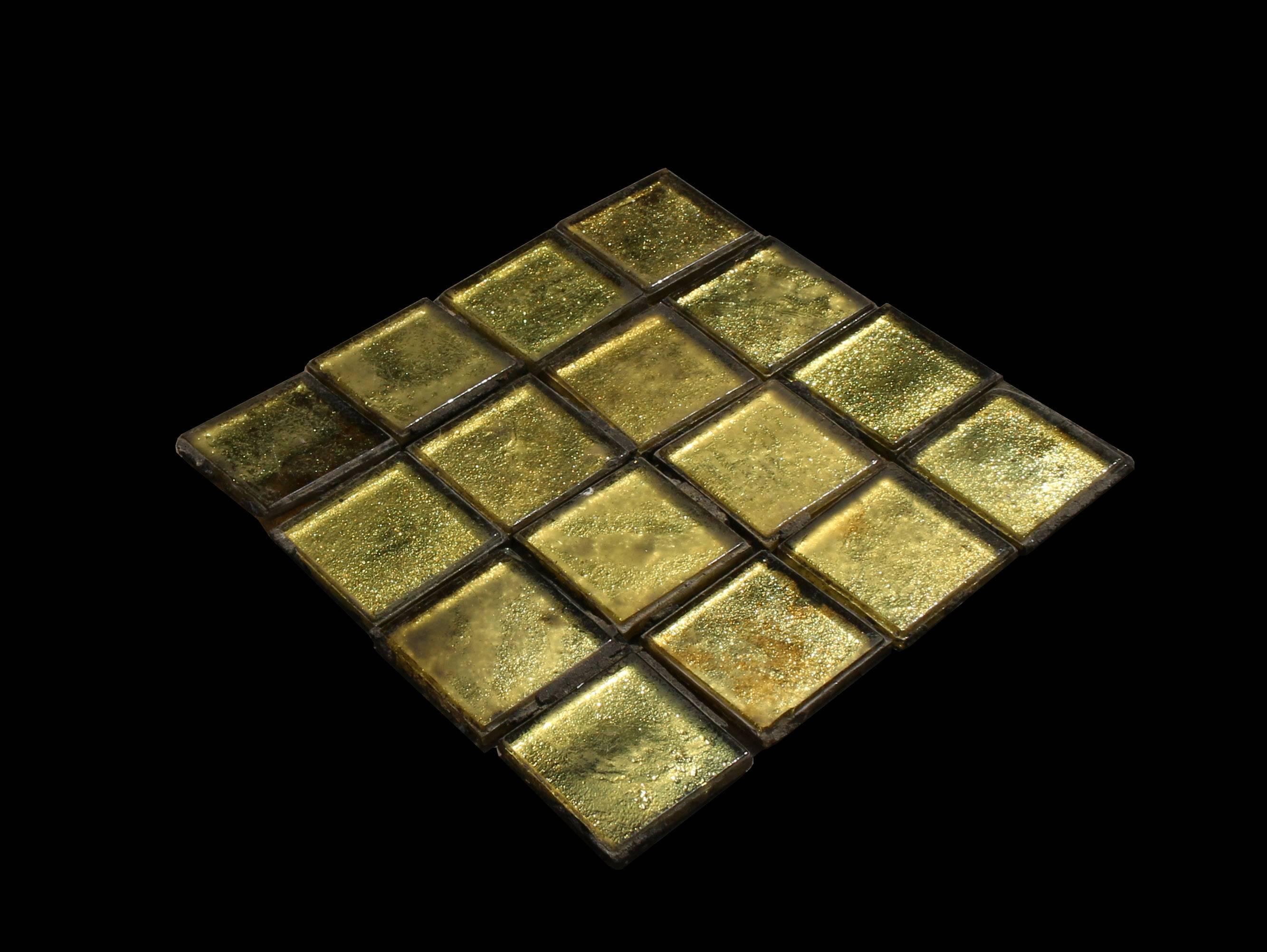 Removed from the principal bathroom of a large manor house.

These are glass with a metal coating on the backs, the two elements fused together with heat during manufacture.

Approximately 1500 tiles available.

Measures: 48 x 48 x 7 mm each.

Image
