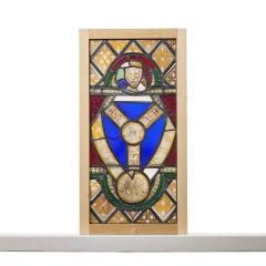 Vitrail du XIXe siècle représentant le blason de la Trinité
