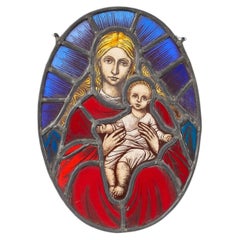 Vetrata rotonda antica raffigurante la Madonna con il Bambino