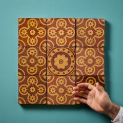 A Set of Nine Reclaimed Encaustic W.Godwin Floral Tiles