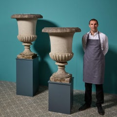 Pair of Large Weathered Composition Stone Campana Urns