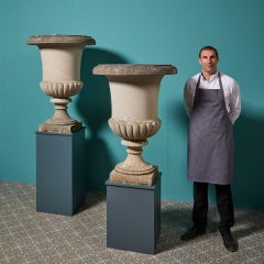 Pair of Large Neoclassical Style Composition Stone Campana Urns