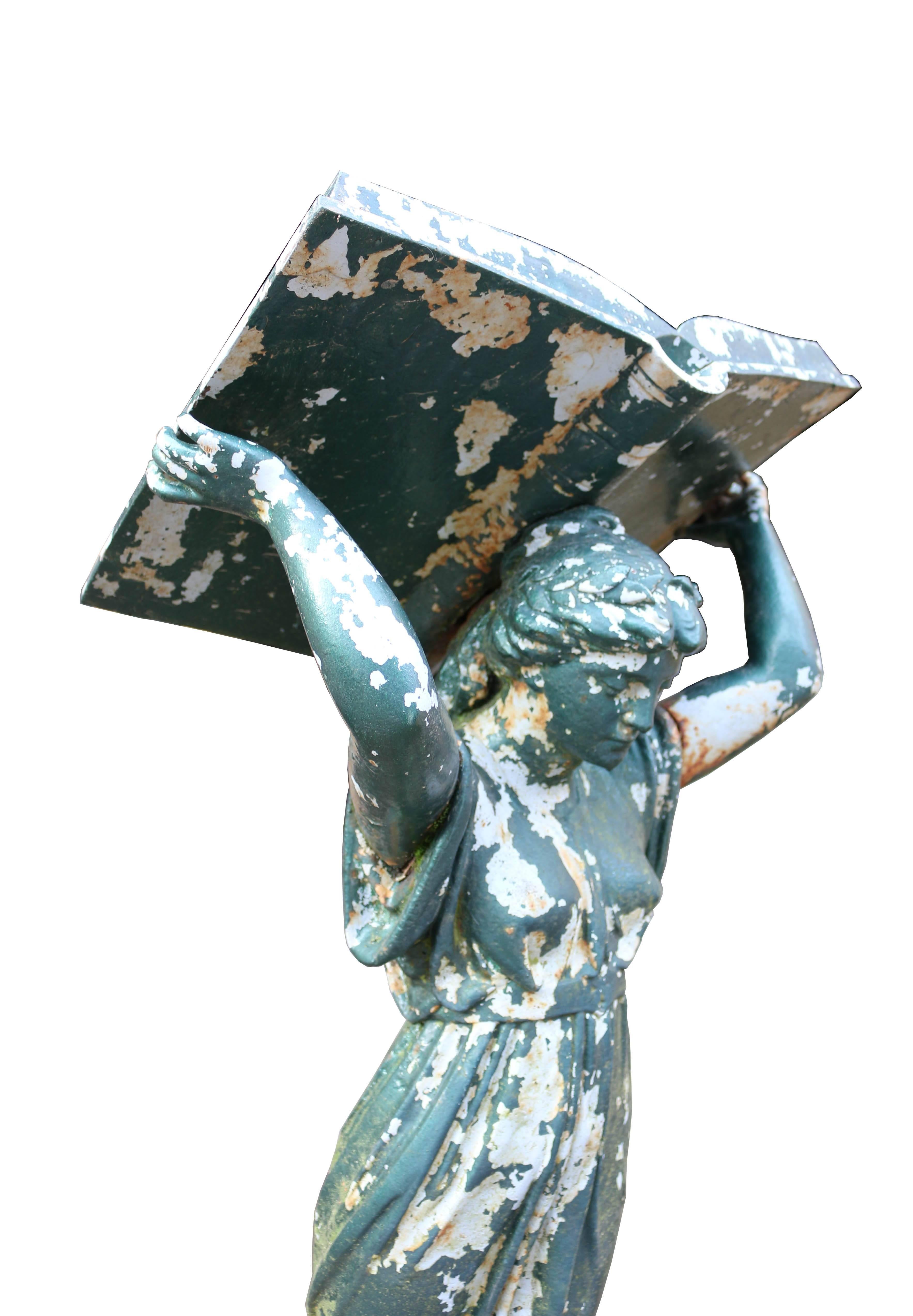 Cast Lectern in the Form of a Woman Holding Aloft the Book of Knowledge