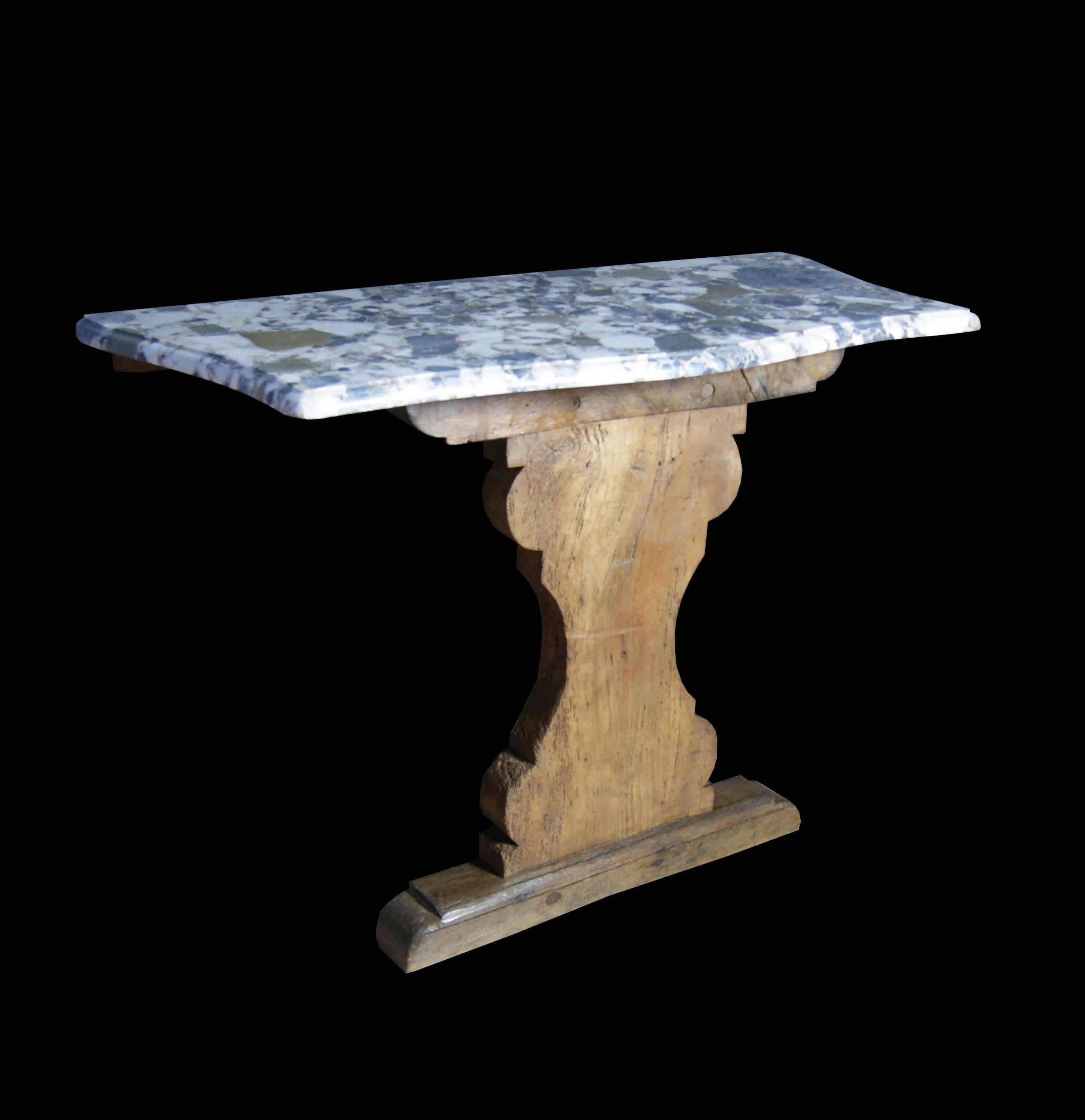 A piece of shaped marble above shaped oak and elm support. This item requires a wall fixing. 17th-18th century elements.