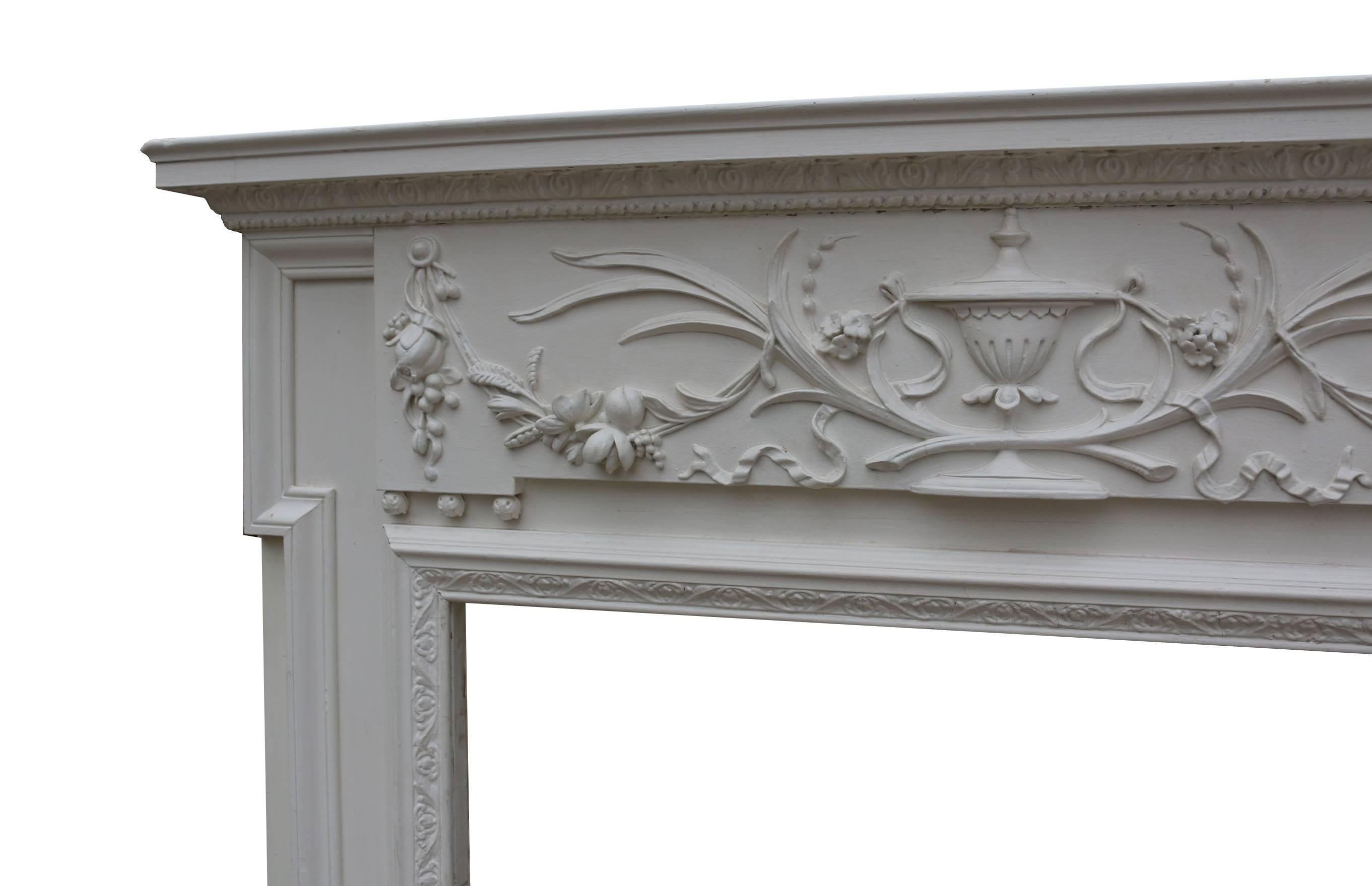 Painted pine and composition fire surround, circa 1900. Measures: Opening height 98.5 cm.
Opening width 107 cm.