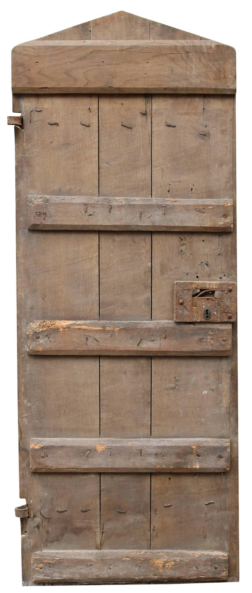 This character door is structurally in very good condition. There have been many old repairs over the years and an old insect attack on the back side.
The lock has seized and there are old hinges present.
Weight 45 kg.
 