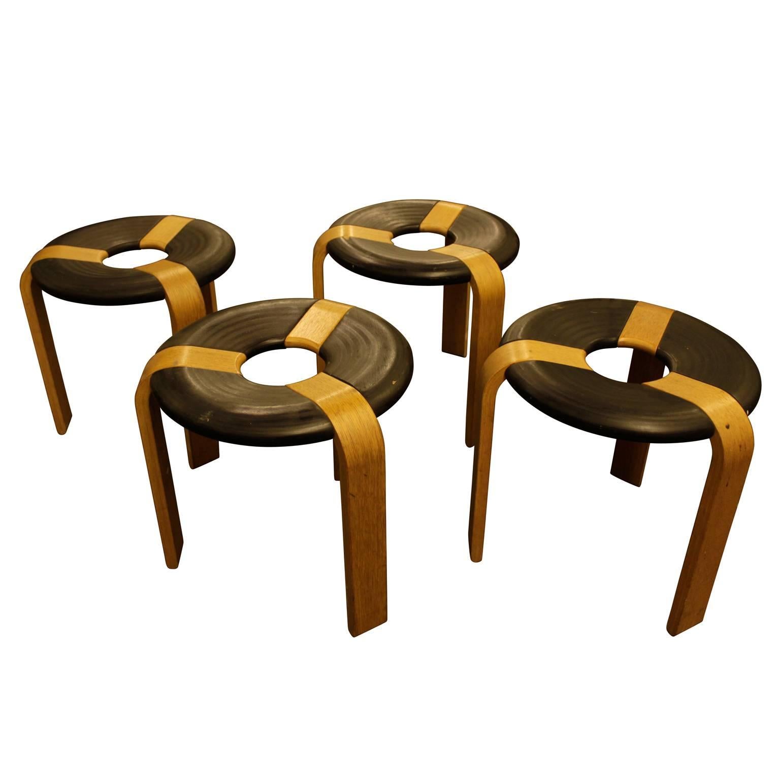 These three-legged, wooden stools, feature unique 