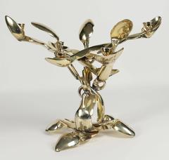 Arman Pair of African Spoon Gilded Bronze Candlesticks