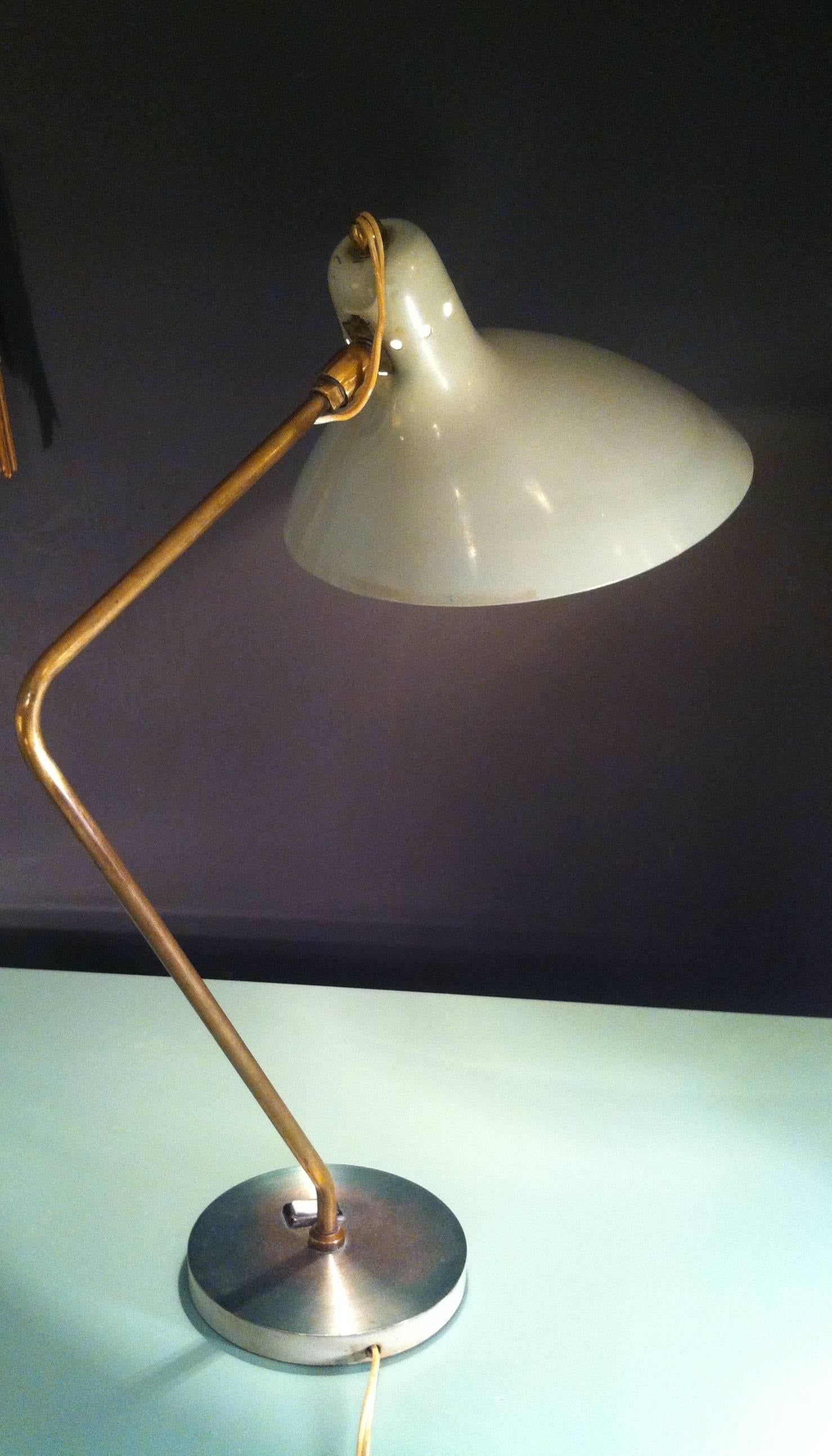 French 1950 table lamp by Boris Lacroix.
Very light green metal and brass.
Chromed base with a switch.
Good original condition. A small dent of 1 mm on the shade.
Measures: Height 50 cm x width 24 cm x depth 44 cm.
 